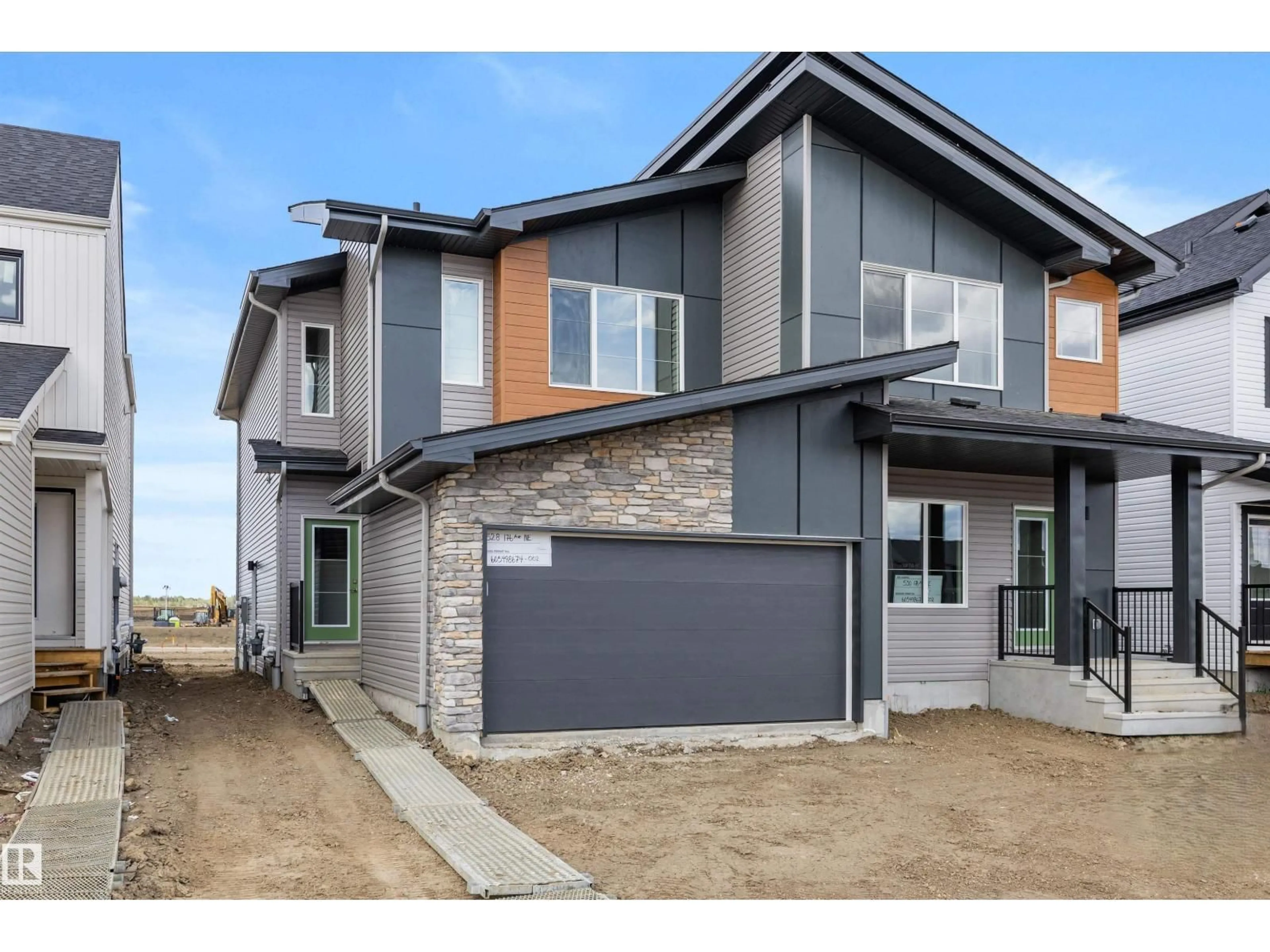 Home with brick exterior material, street for NE - 528 176 AV, Edmonton Alberta T5Y4J9