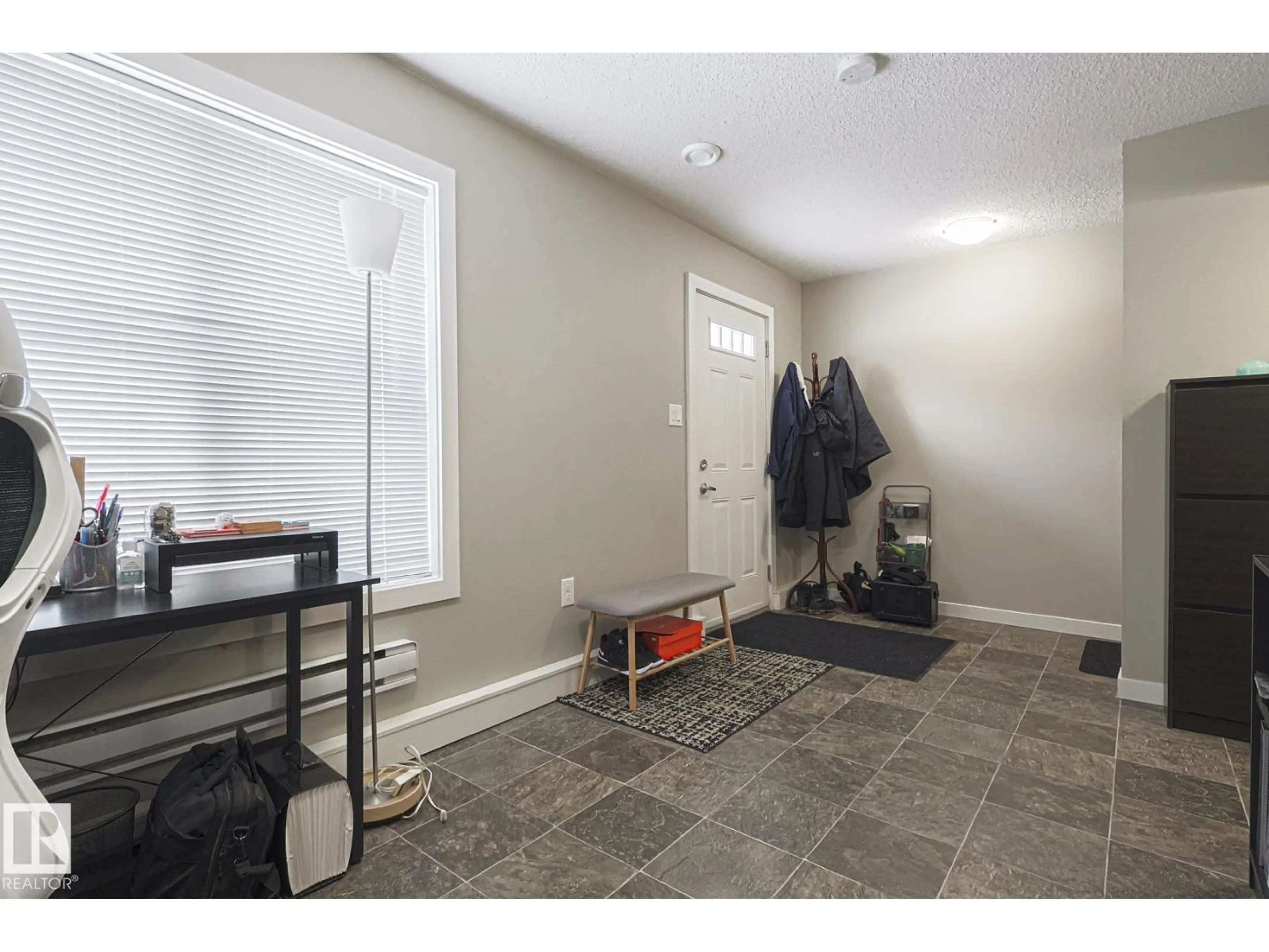 Indoor entryway for #103 - 2803 JAMES MOWATT TR, Edmonton Alberta T6W2P5