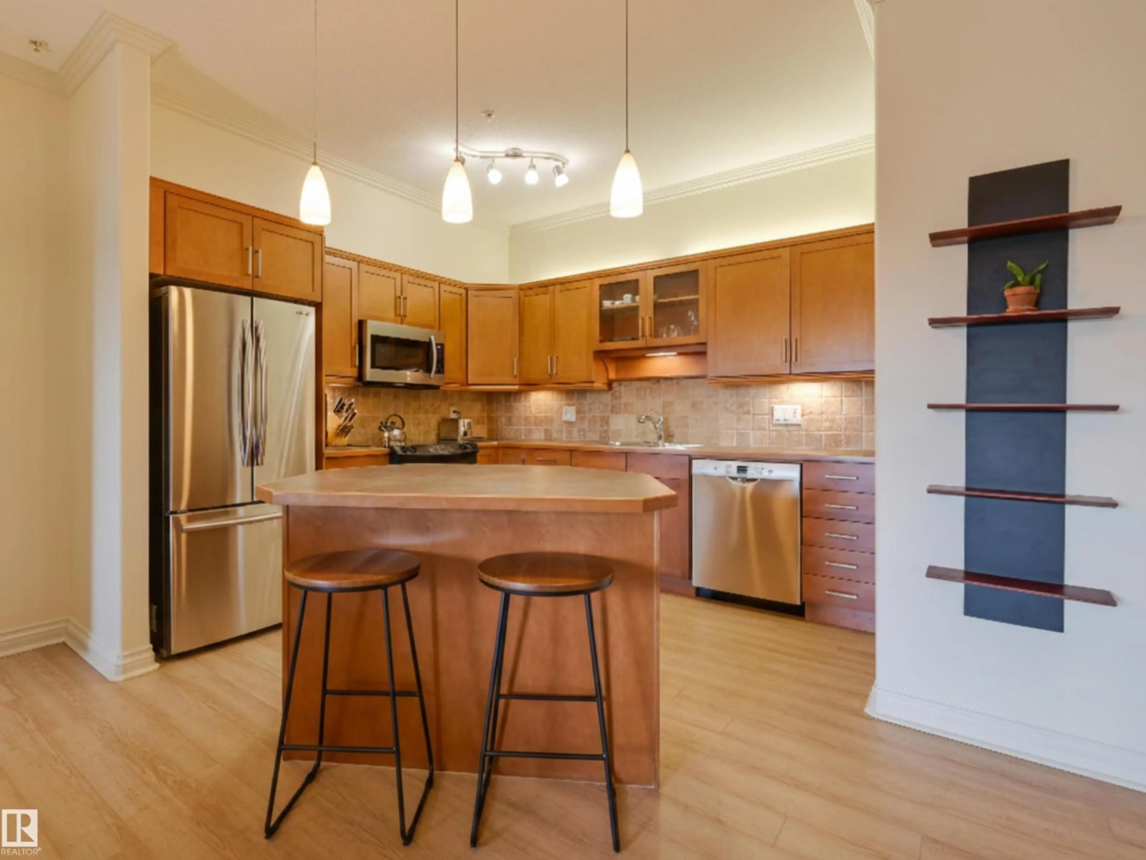 Open concept kitchen, wood/laminate floor for #301 - 14205 96 AV, Edmonton Alberta T5N0C2