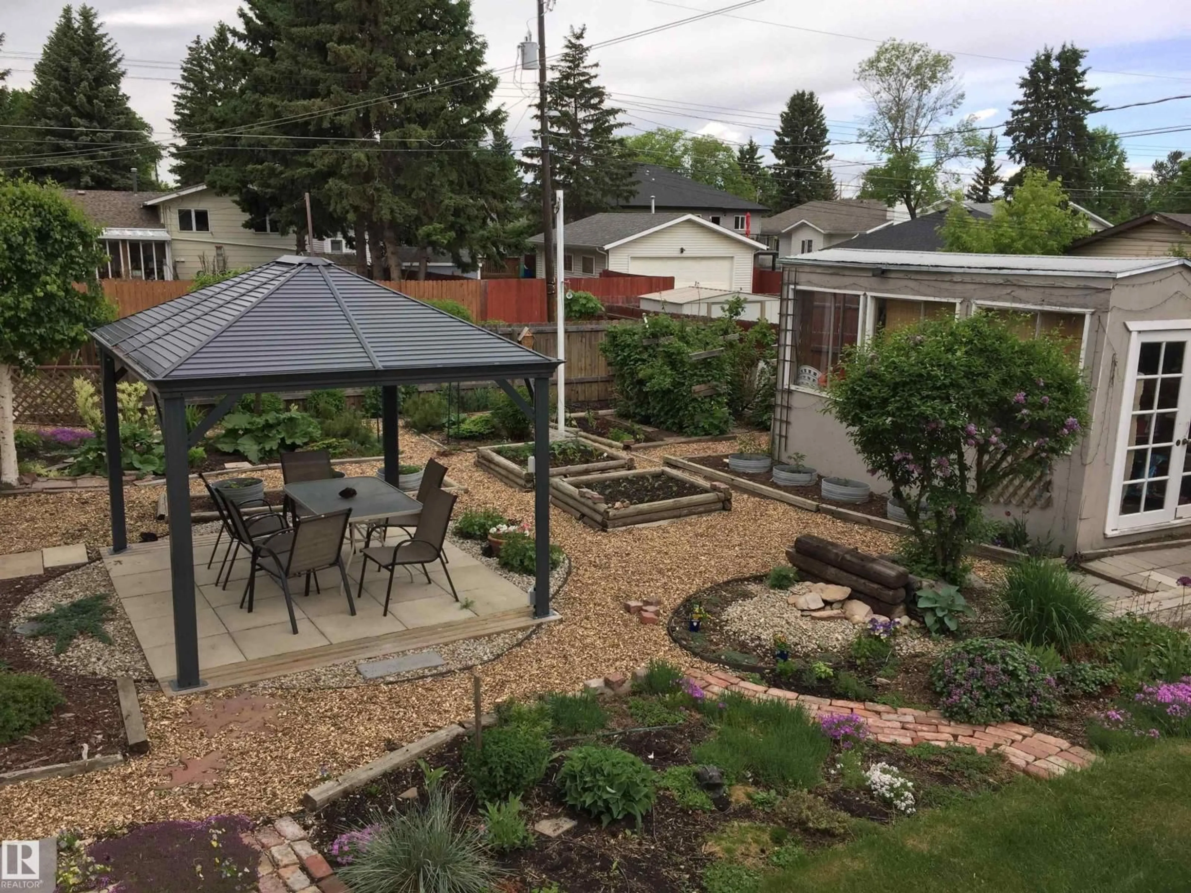 A pic from outside/outdoor area/front of a property/back of a property/a pic from drone, mountain view for NW - 9924 152 ST, Edmonton Alberta T5P1X5