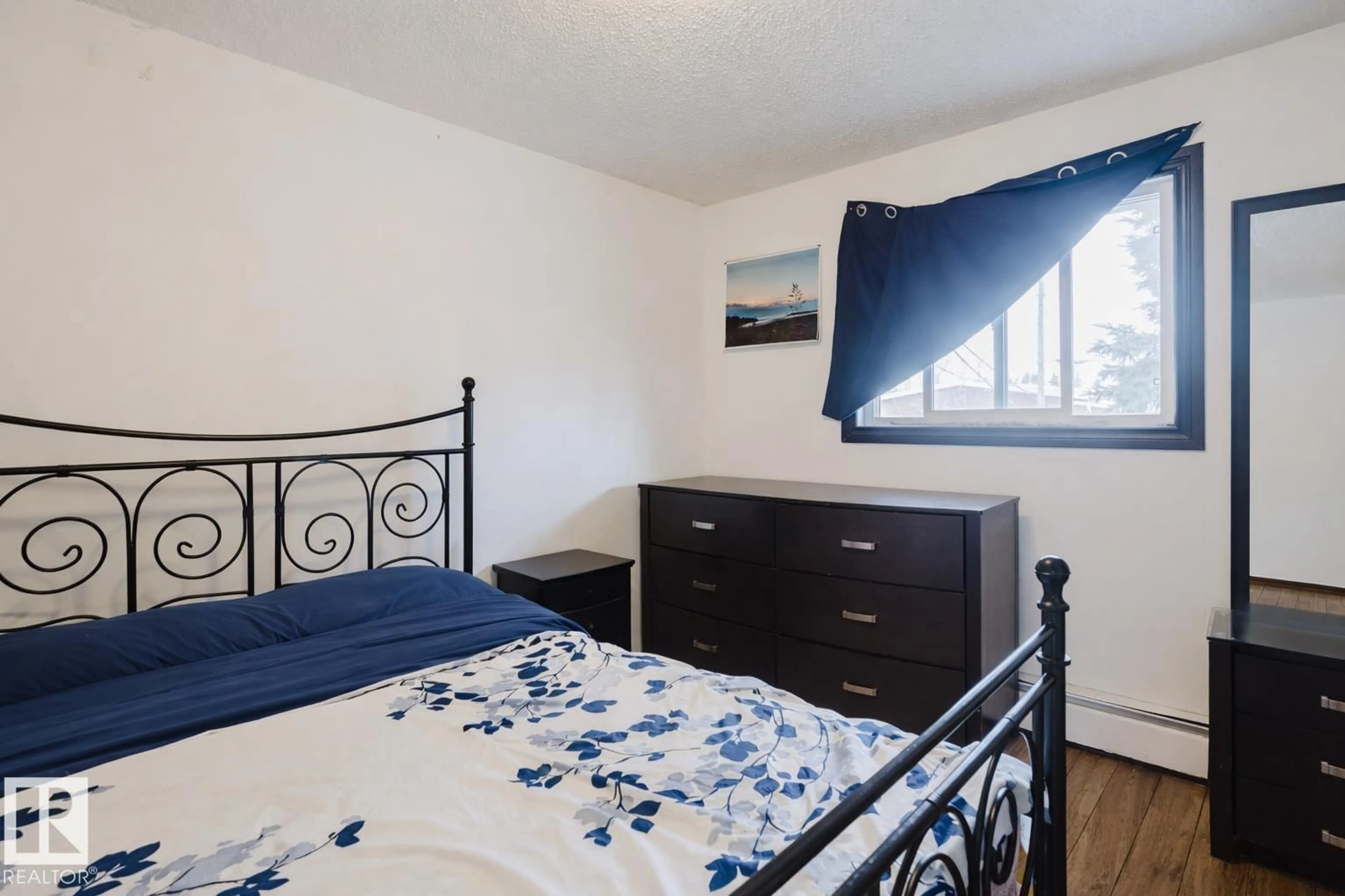 Bedroom with bed, unknown for 3917/3919 54 ST, Wetaskiwin Alberta T9A1S6