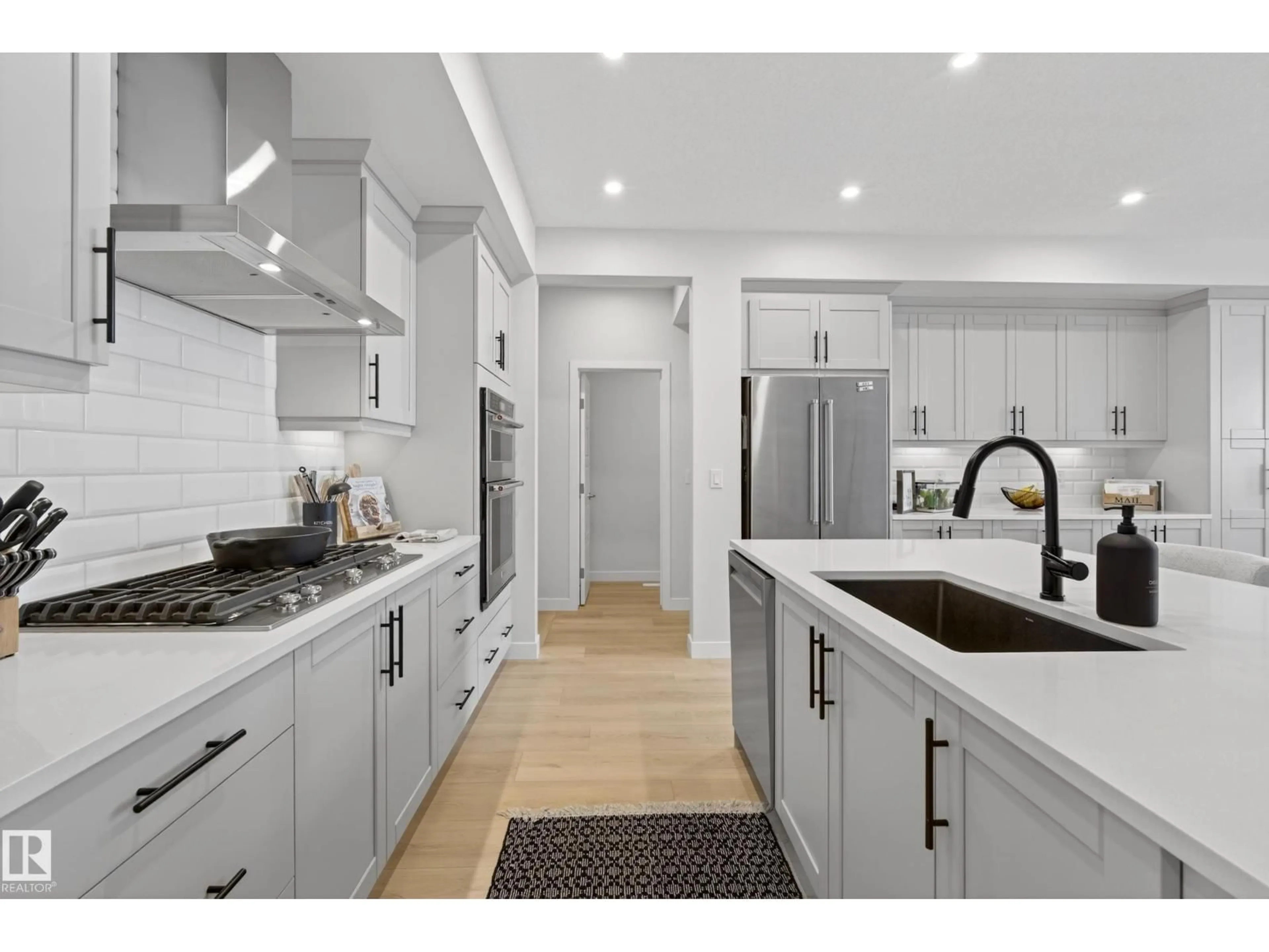 Open concept kitchen, ceramic/tile floor for 19286 22A AV, Edmonton Alberta T6M1P8