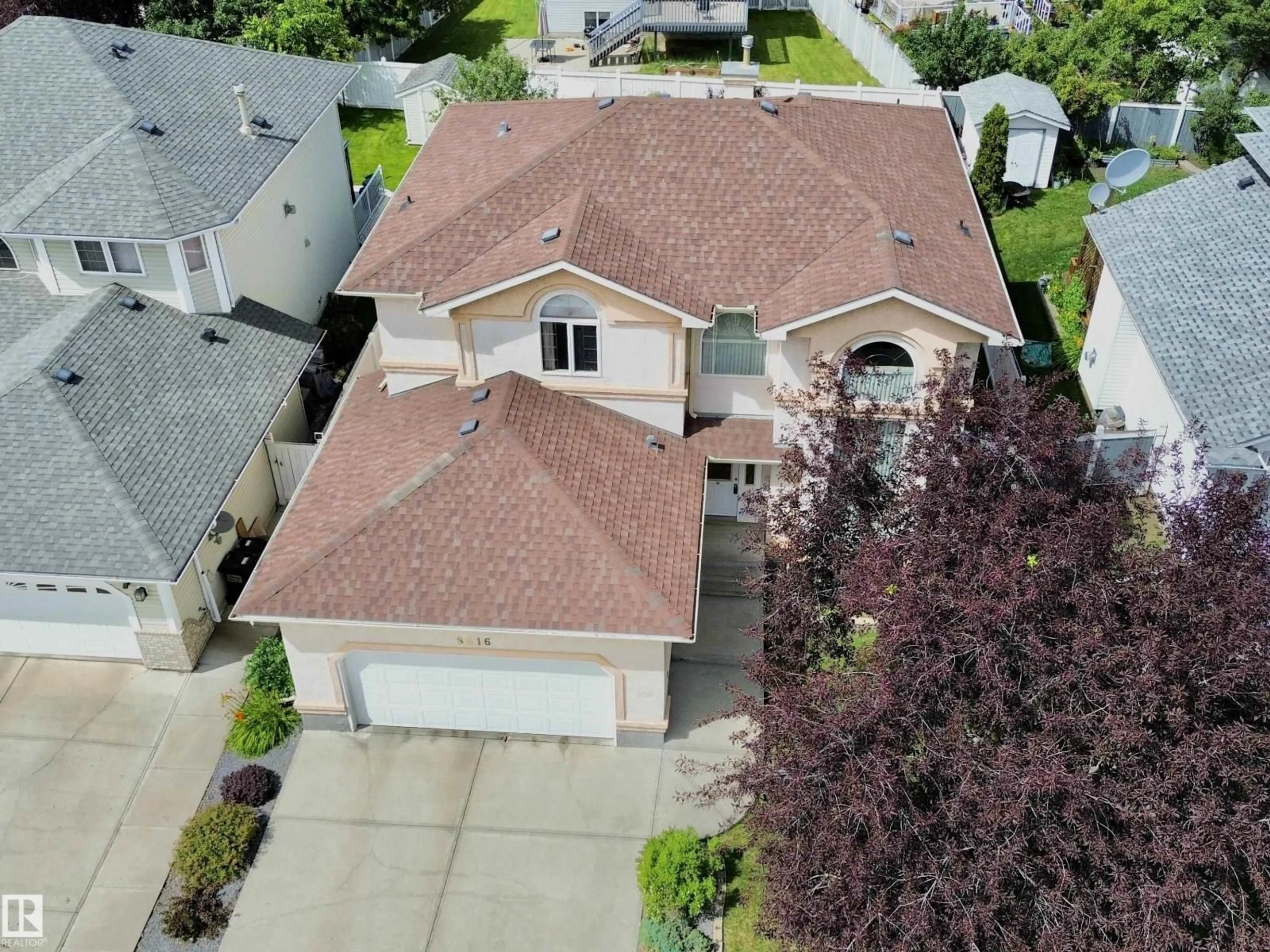 A pic from outside/outdoor area/front of a property/back of a property/a pic from drone, street for 8416 160A AV, Edmonton Alberta T5Z3K2