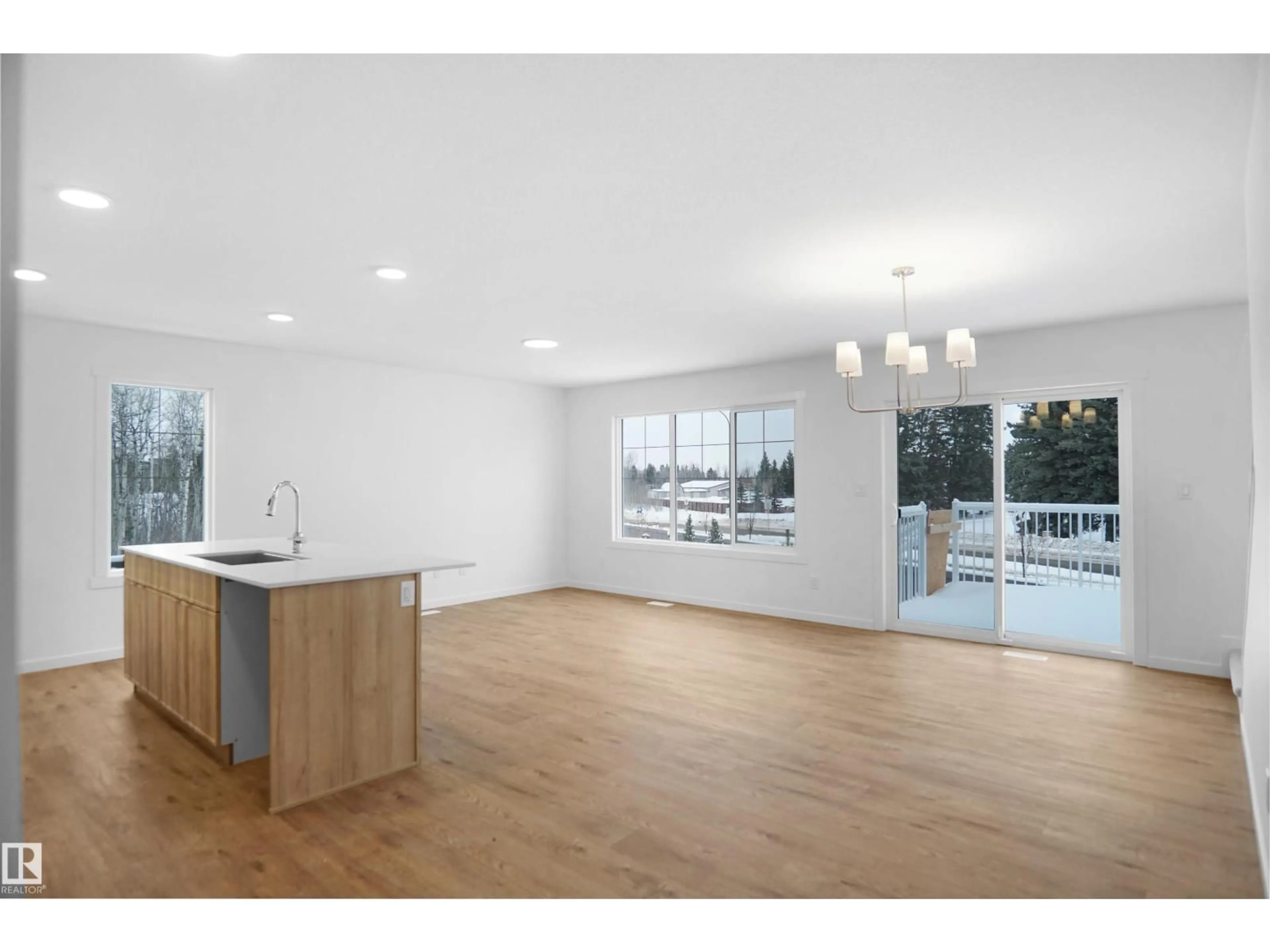 Open concept kitchen, wood/laminate floor for #17 - 19904 31 AV, Edmonton Alberta T6M1N7