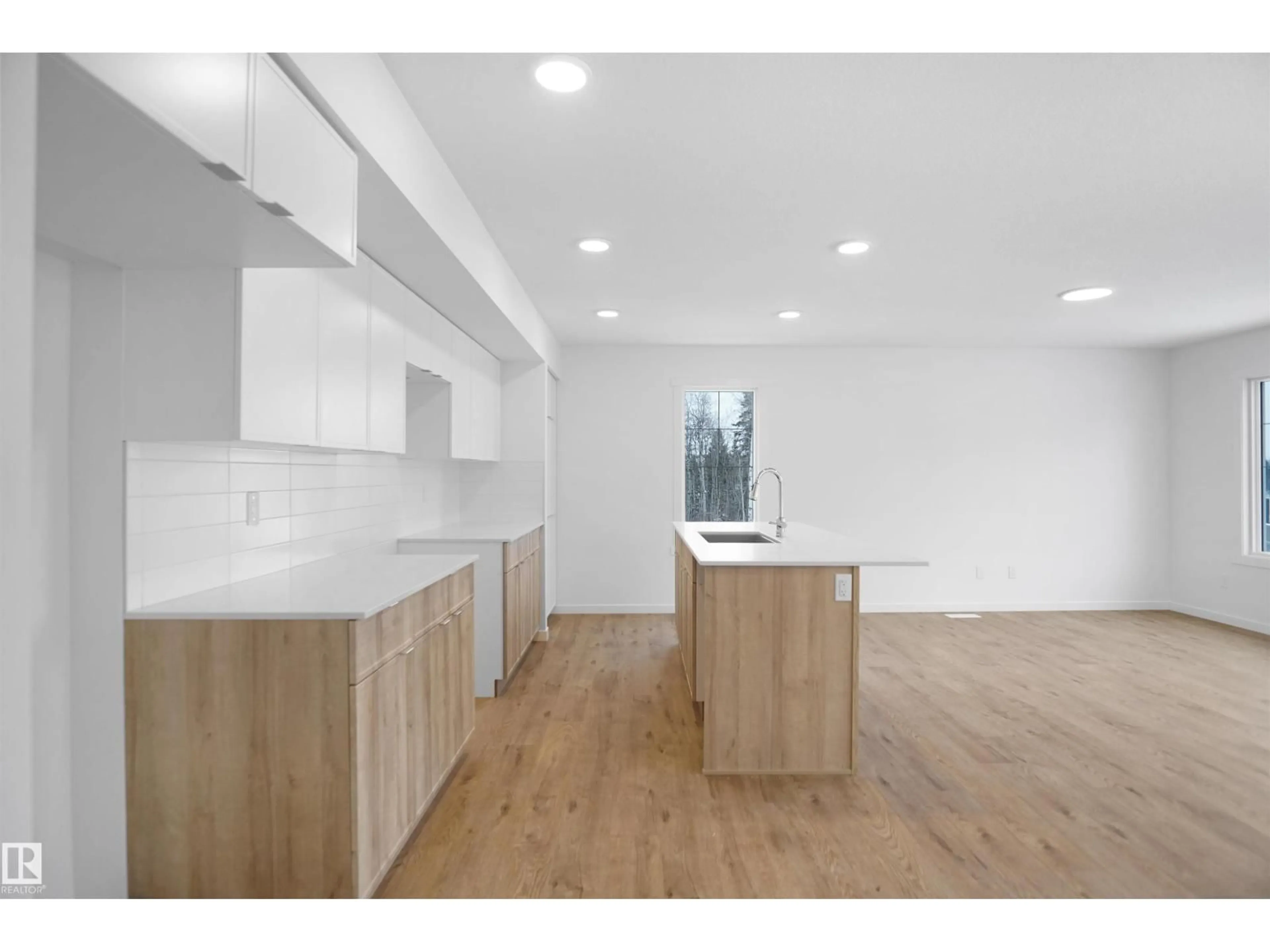 Open concept kitchen, wood/laminate floor for #17 - 19904 31 AV, Edmonton Alberta T6M1N7