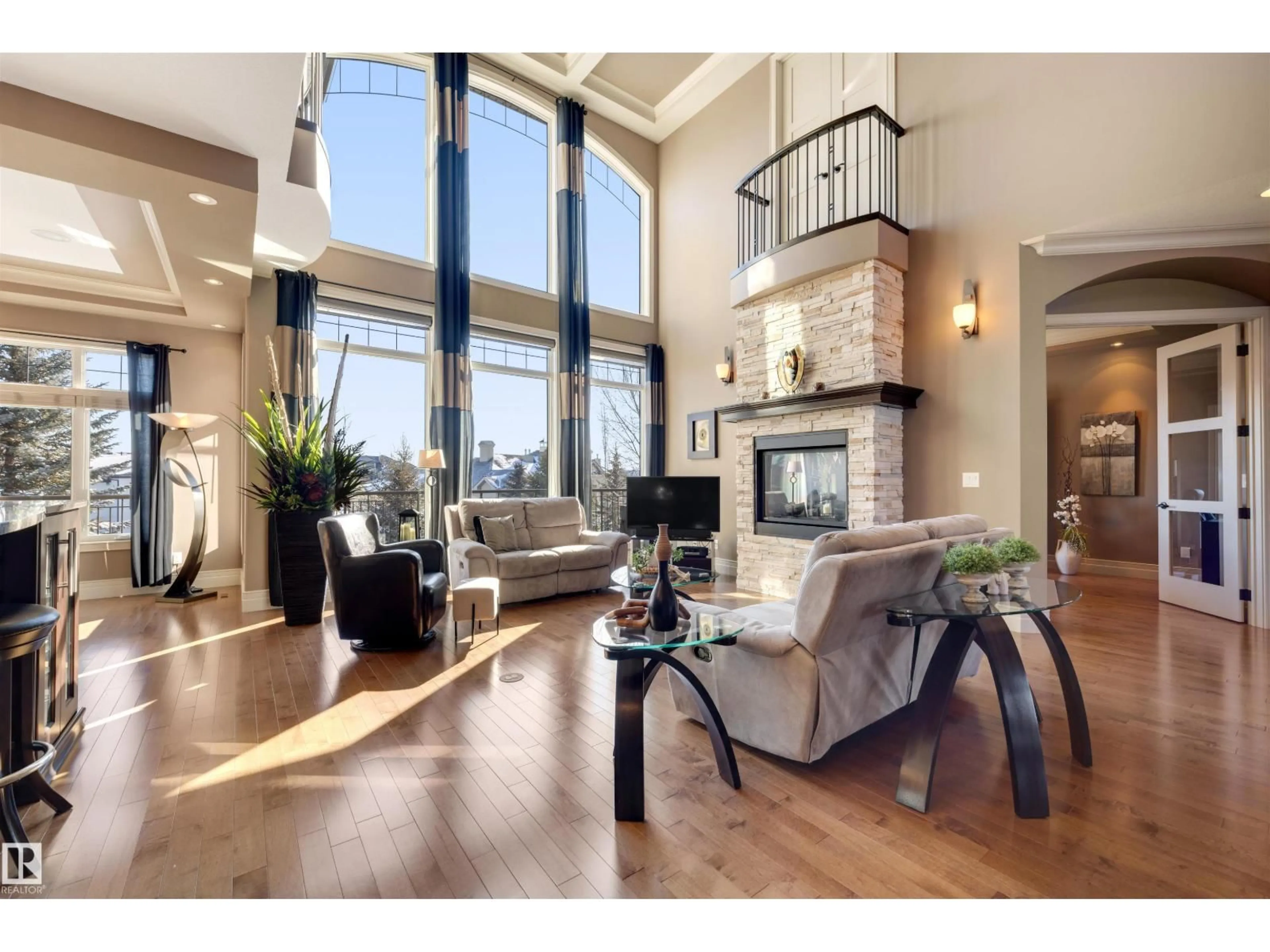 Living room with furniture, wood/laminate floor for 33 54403 RGE ROAD 251, Rural Sturgeon County Alberta T8T0B5