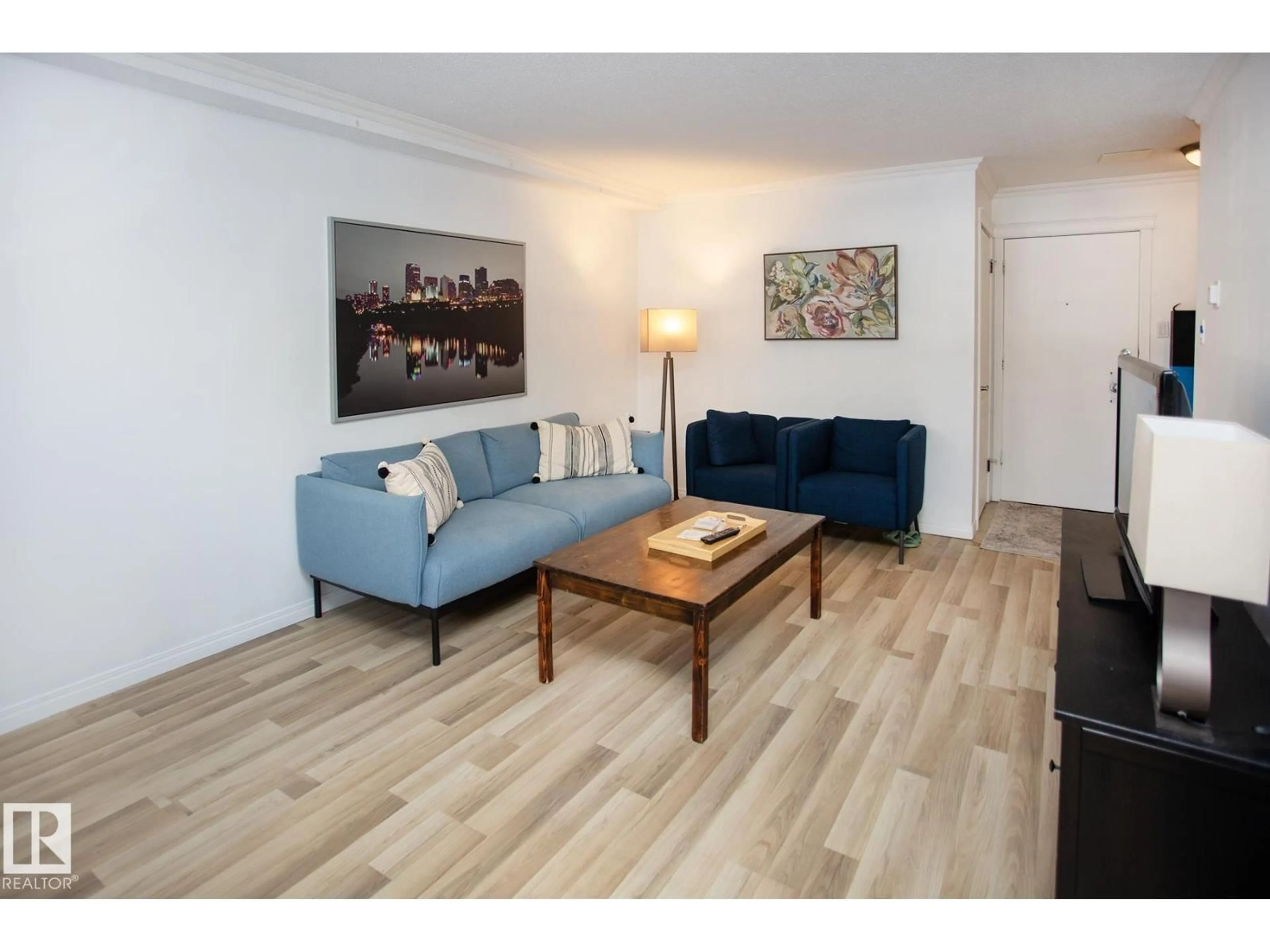 Living room with furniture, wood/laminate floor for #104 - 9925 83 AV, Edmonton Alberta T6E2B9