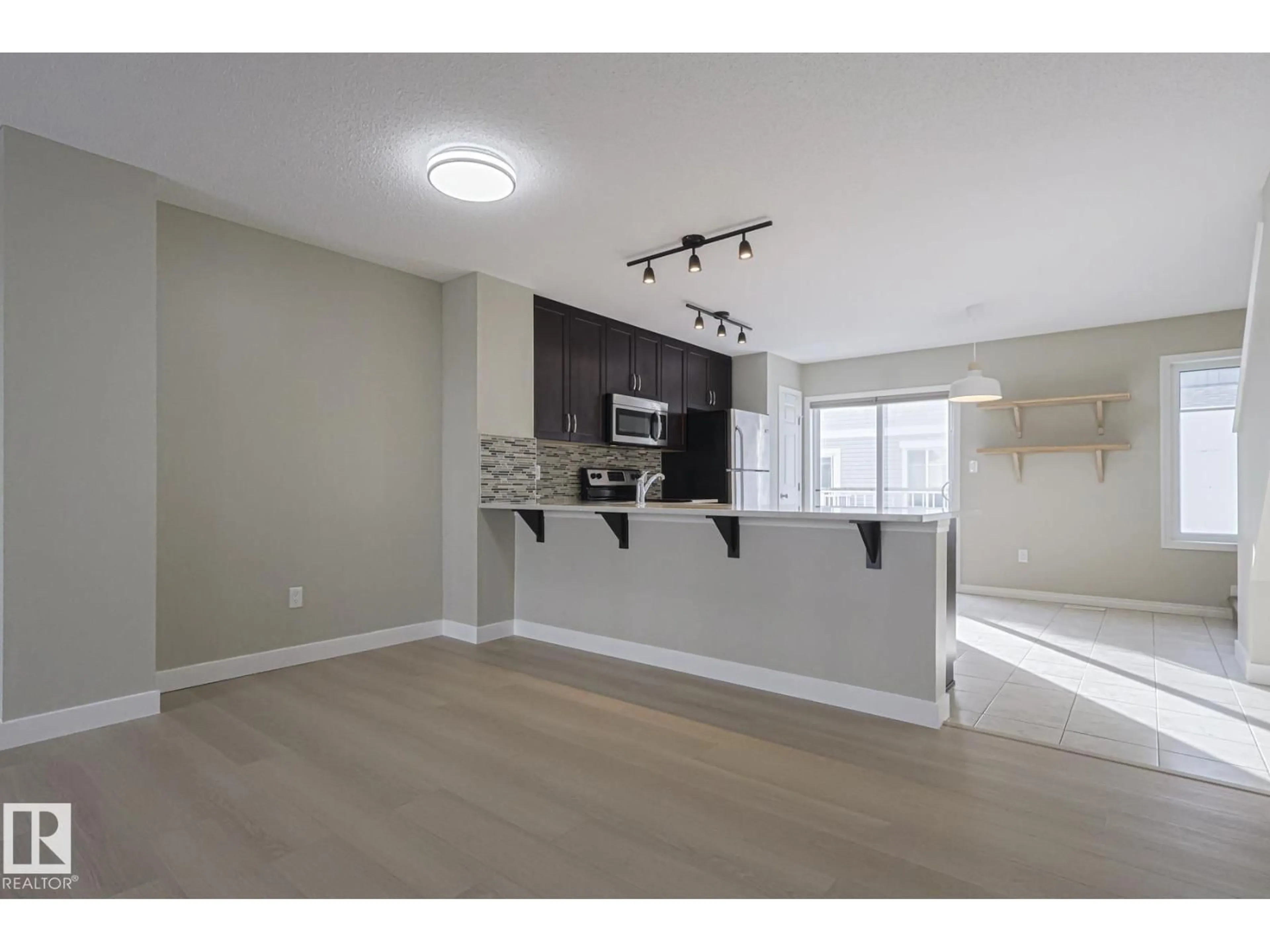 Open concept kitchen, unknown for #131 - 2905 141 ST, Edmonton Alberta T6W3M4