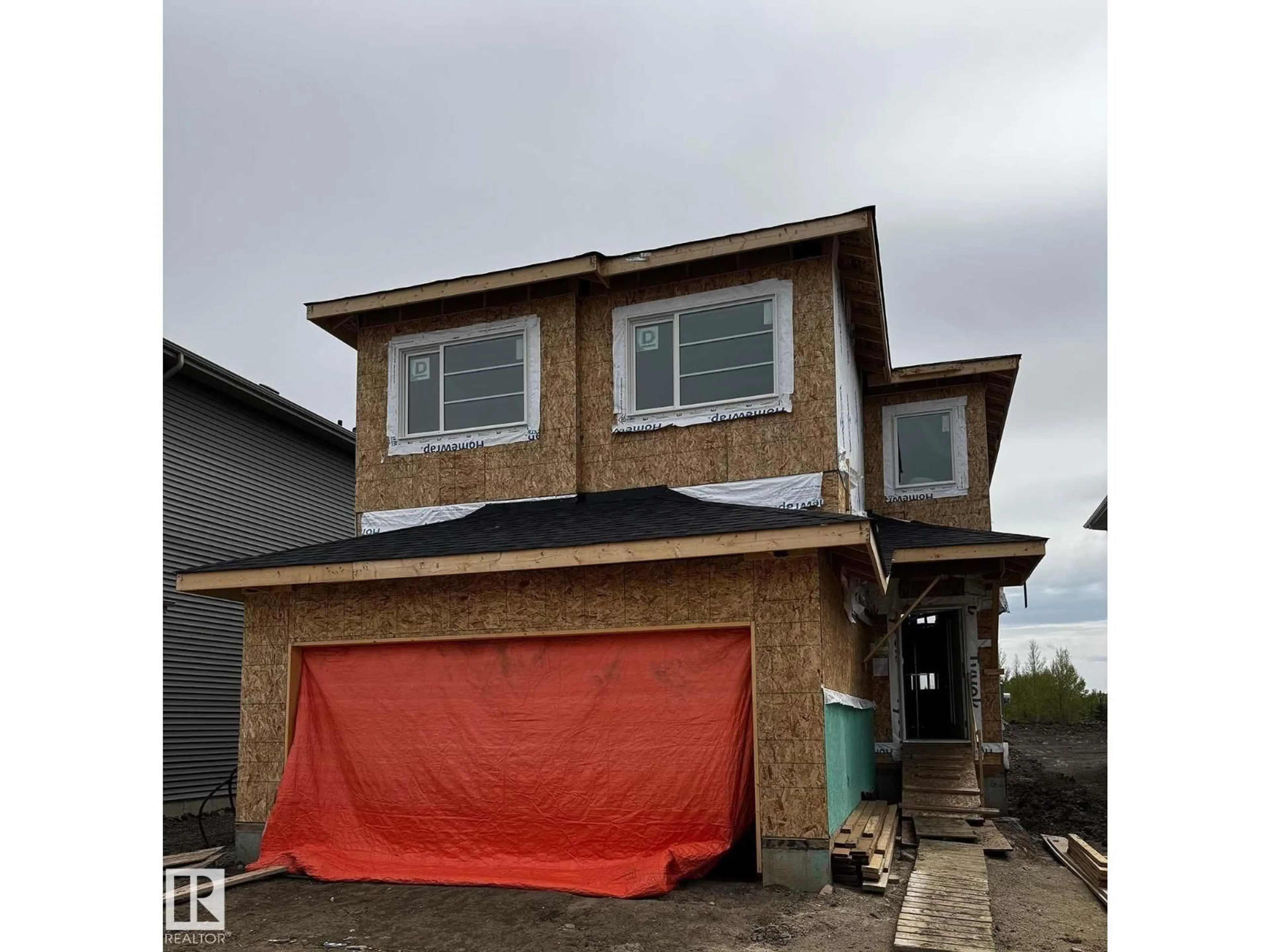 Home with vinyl exterior material, street for 1915 63 AV, Rural Leduc County Alberta T4X3C9