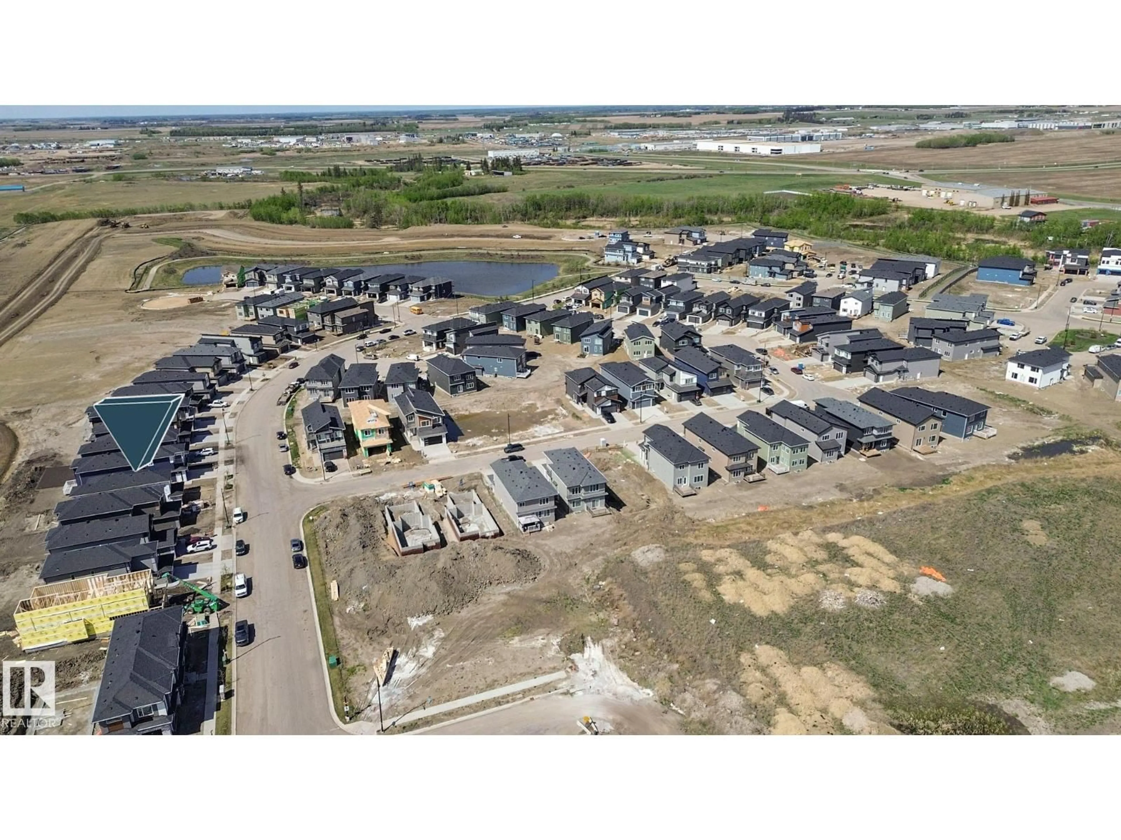 A pic from outside/outdoor area/front of a property/back of a property/a pic from drone, street for 1915 63 AV, Rural Leduc County Alberta T4X3C9
