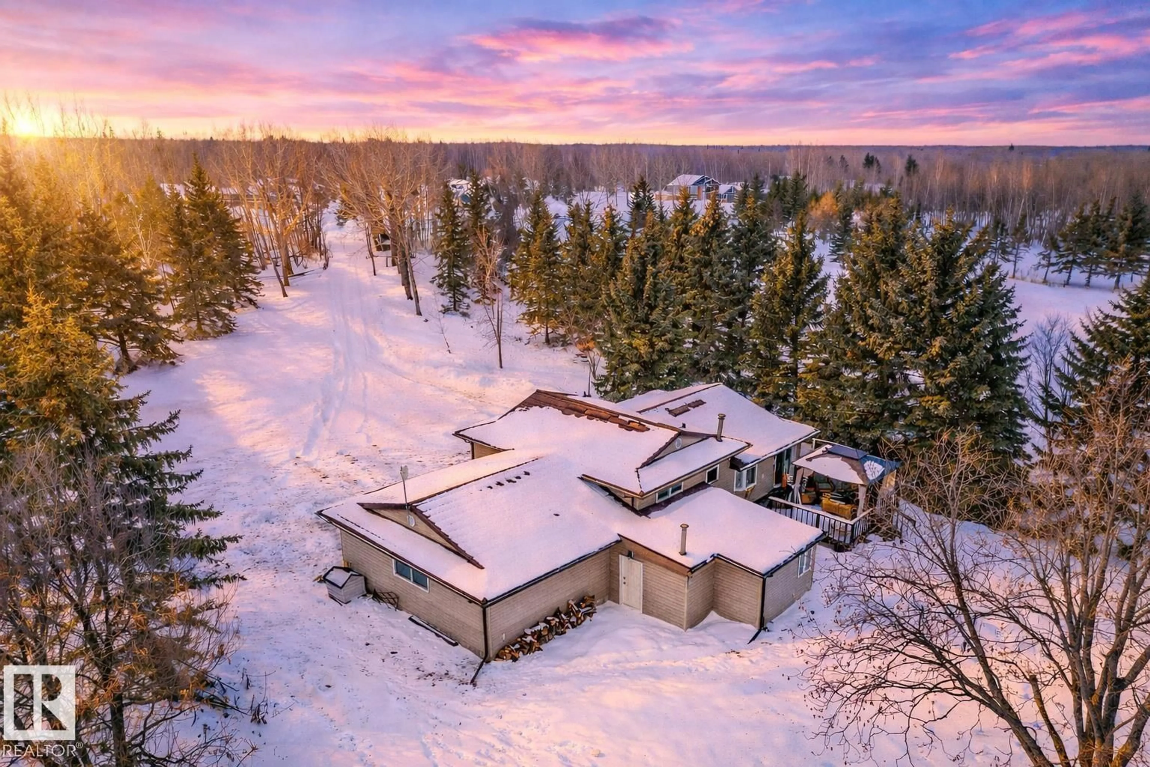 A pic from outside/outdoor area/front of a property/back of a property/a pic from drone, mountain view for #2 - 52510 RGE ROAD 213, Rural Strathcona County Alberta T8G2E6