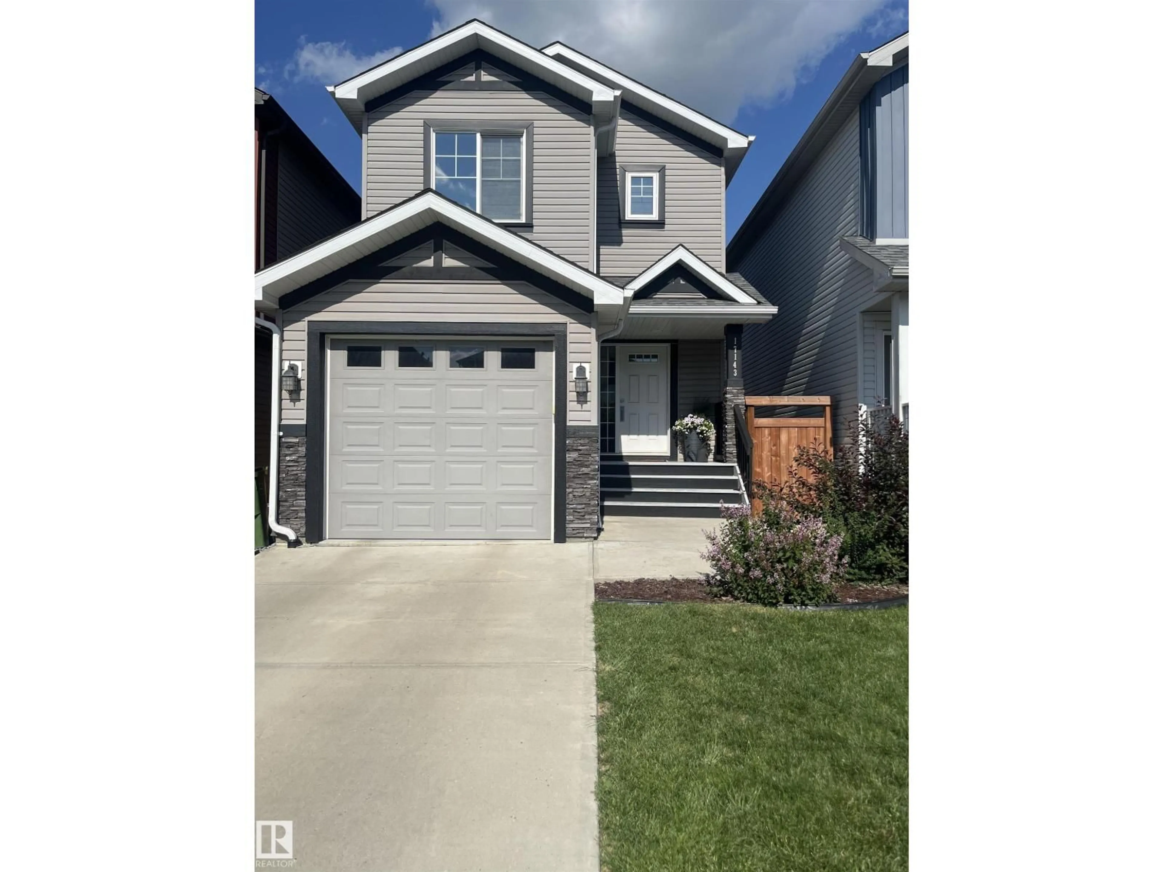 Home with vinyl exterior material, street for 17143 38 ST, Edmonton Alberta T6L5A6