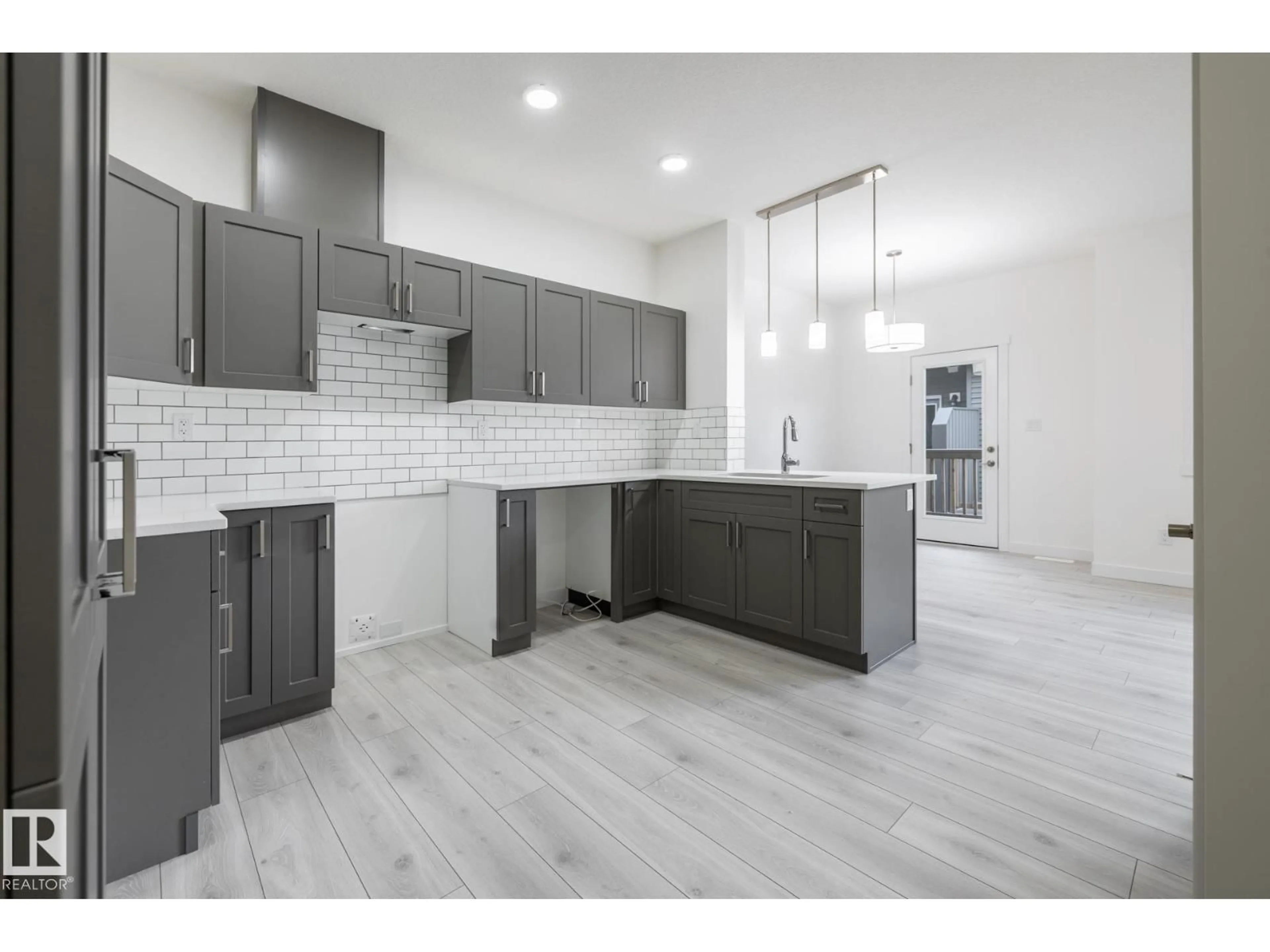 Open concept kitchen, unknown for #50 - 2710 66 ST, Edmonton Alberta T6X3H4