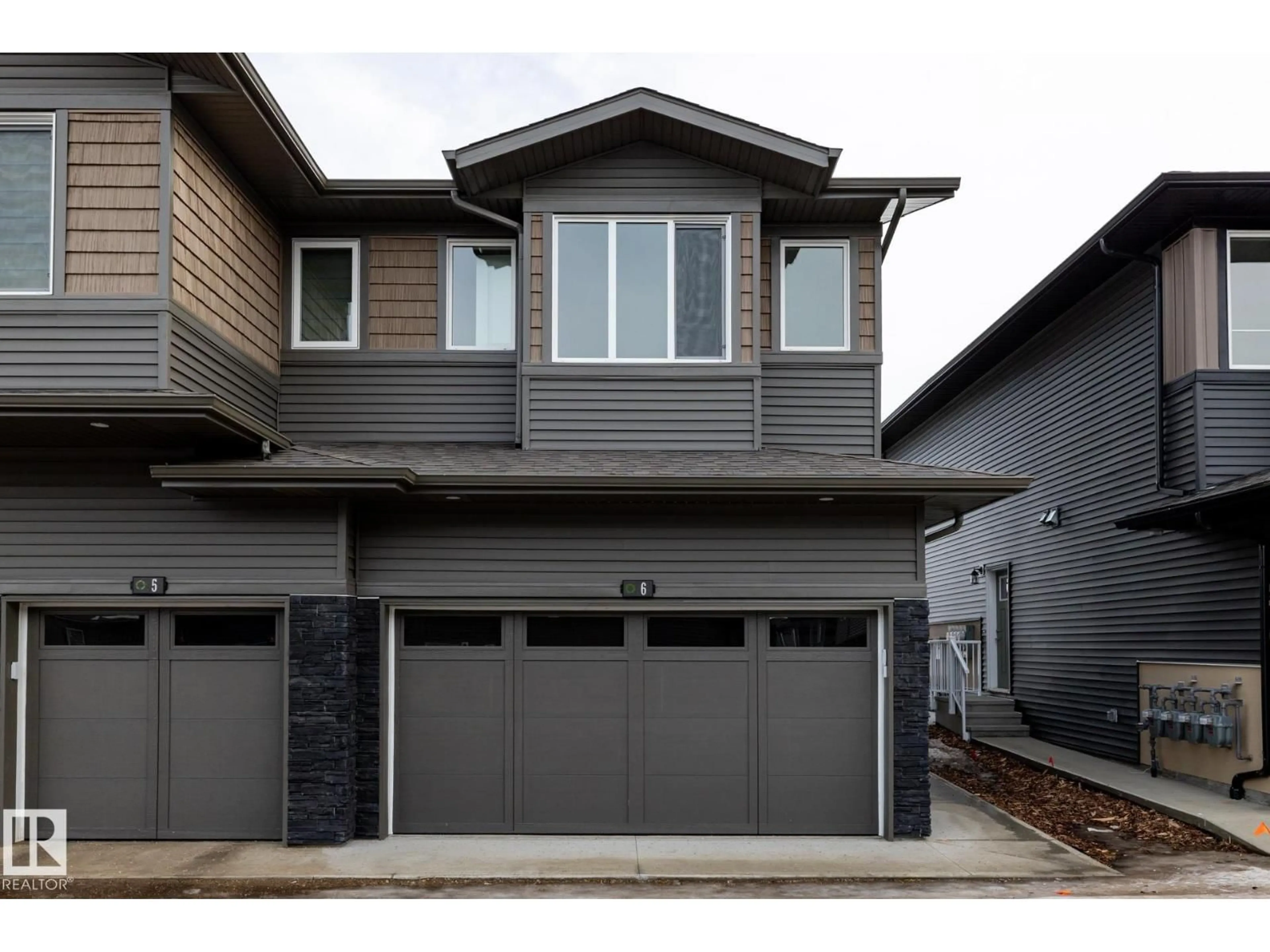 Home with vinyl exterior material, street for #6 - 2710 66 ST, Edmonton Alberta T6X3H4