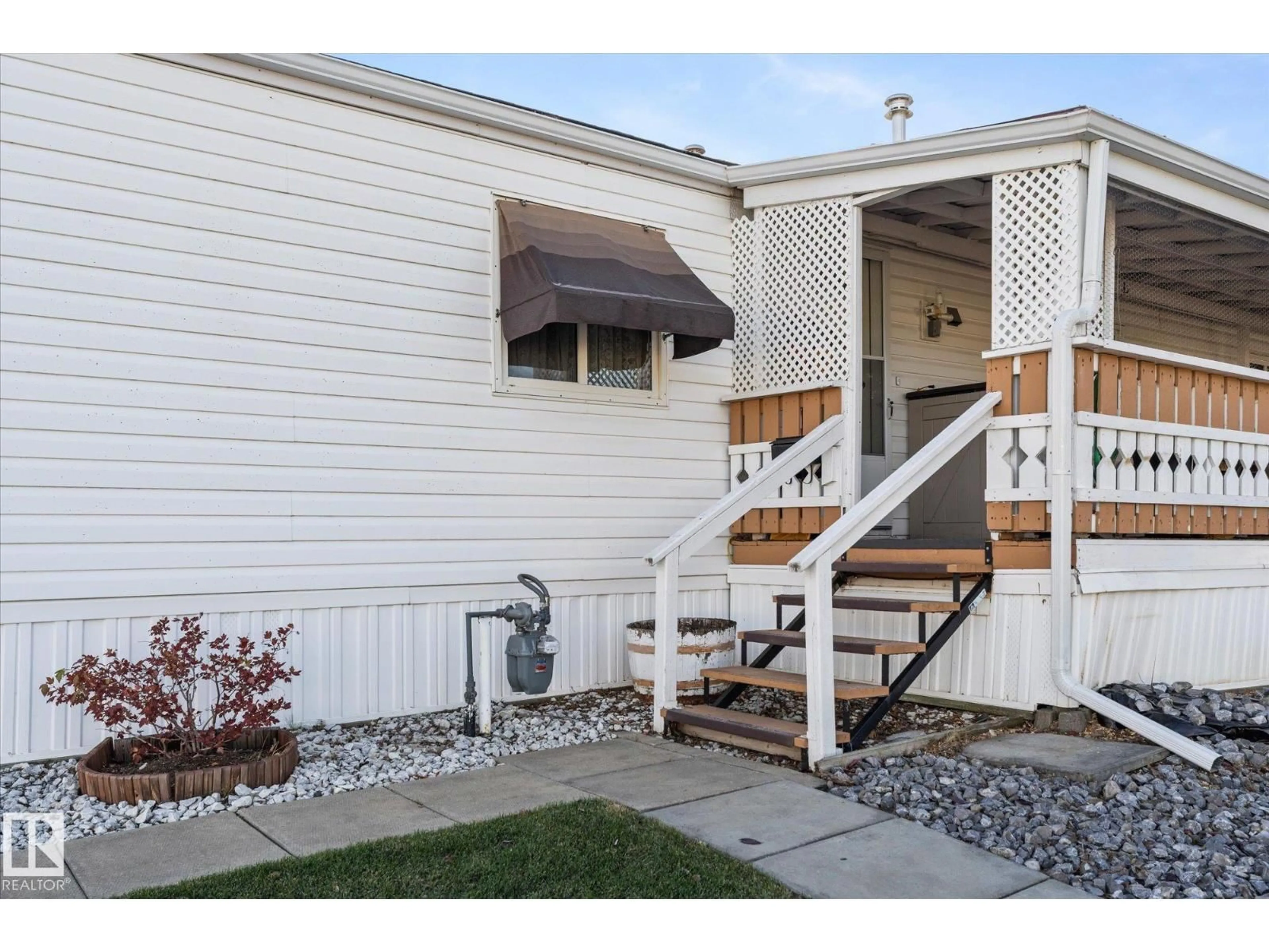 Home with vinyl exterior material, street for 89 3400 48, Stony Plain Alberta T7Z1C1