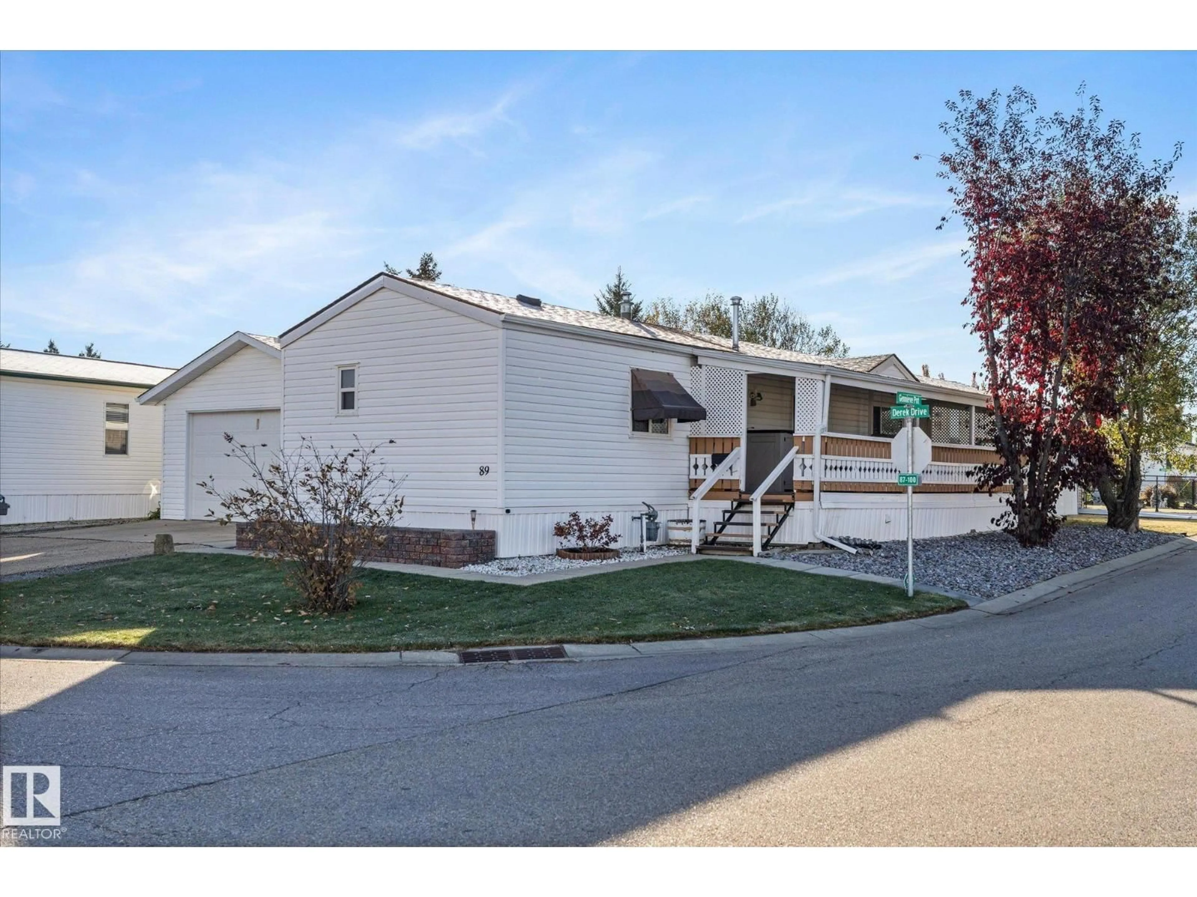 Home with vinyl exterior material, street for 89 3400 48, Stony Plain Alberta T7Z1C1