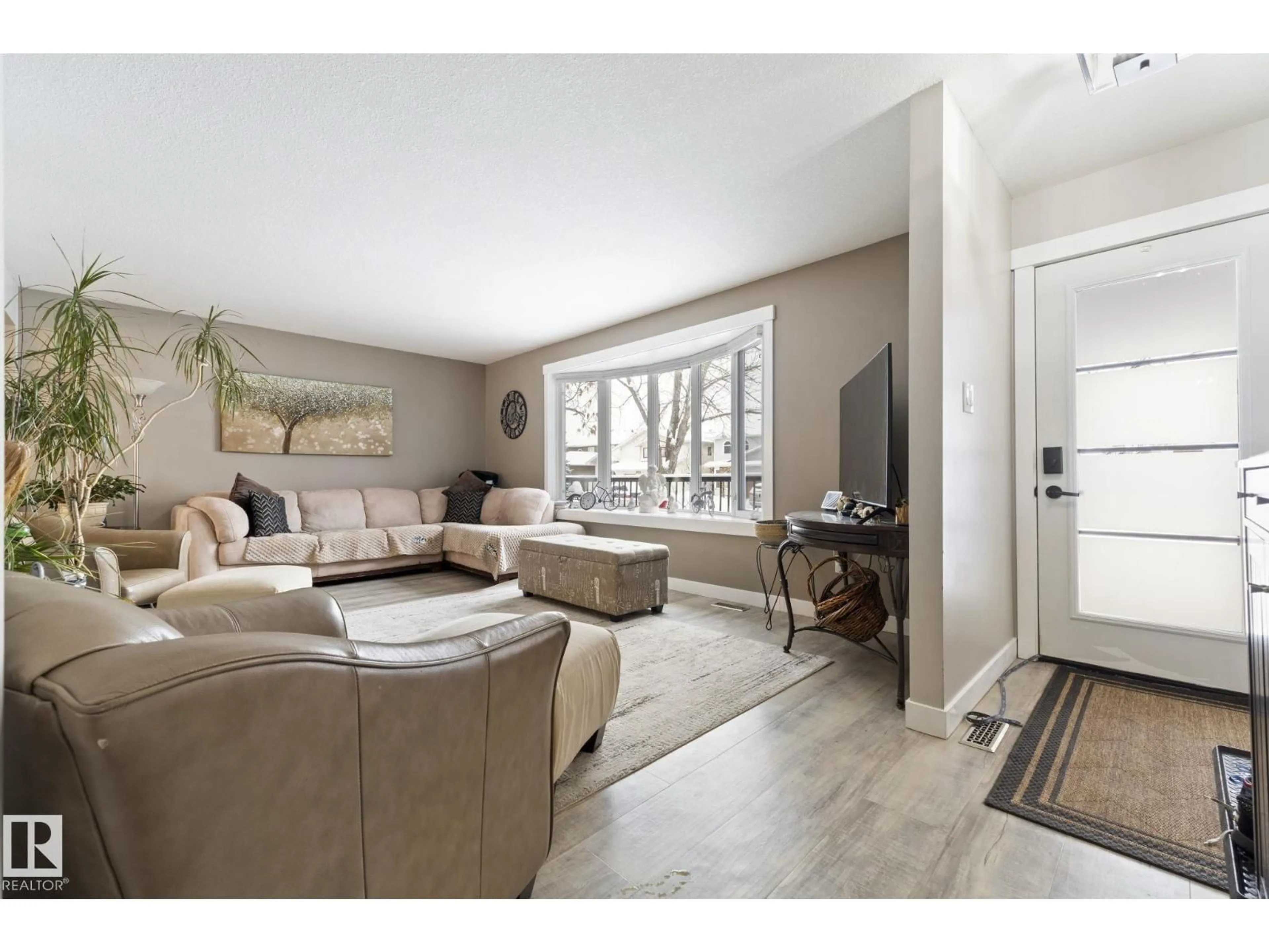 Living room with furniture, unknown for 12116 148 AV, Edmonton Alberta T5K1V6