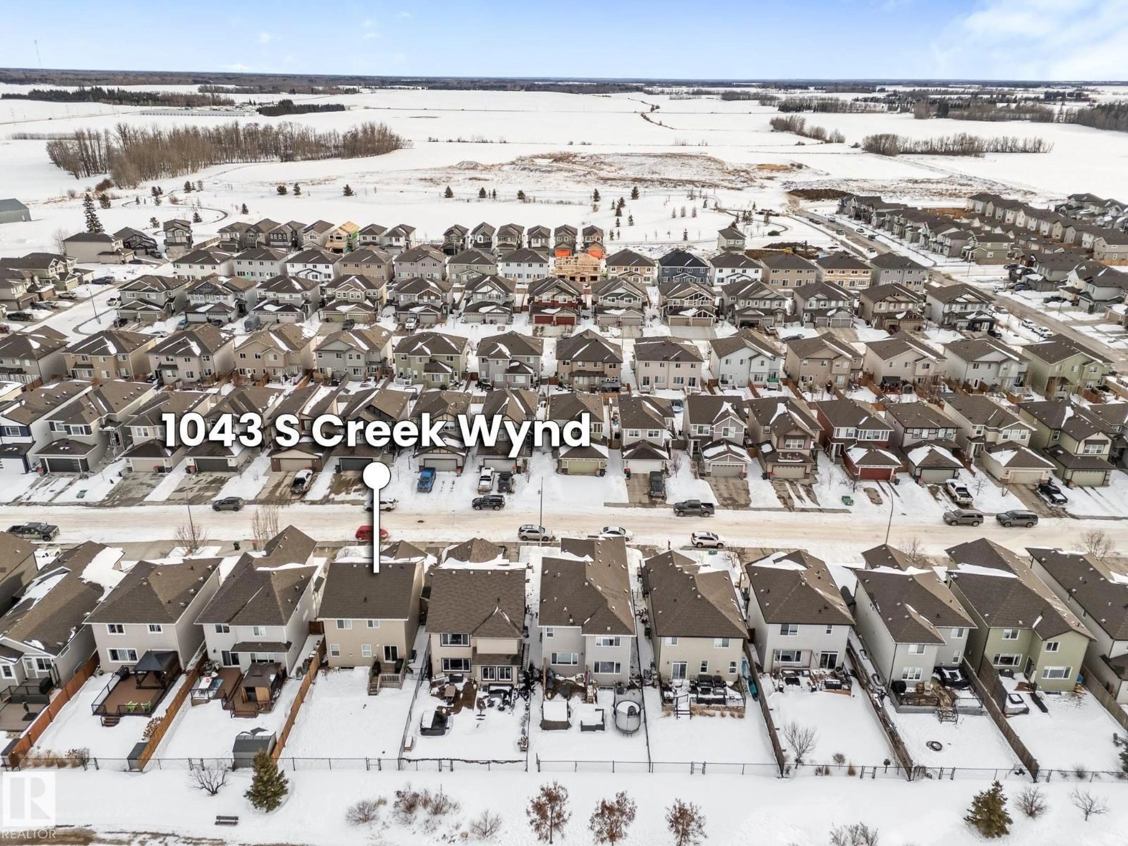 A pic from outside/outdoor area/front of a property/back of a property/a pic from drone, street for 1043 SOUTH CREEK WD, Stony Plain Alberta T7Z0C9