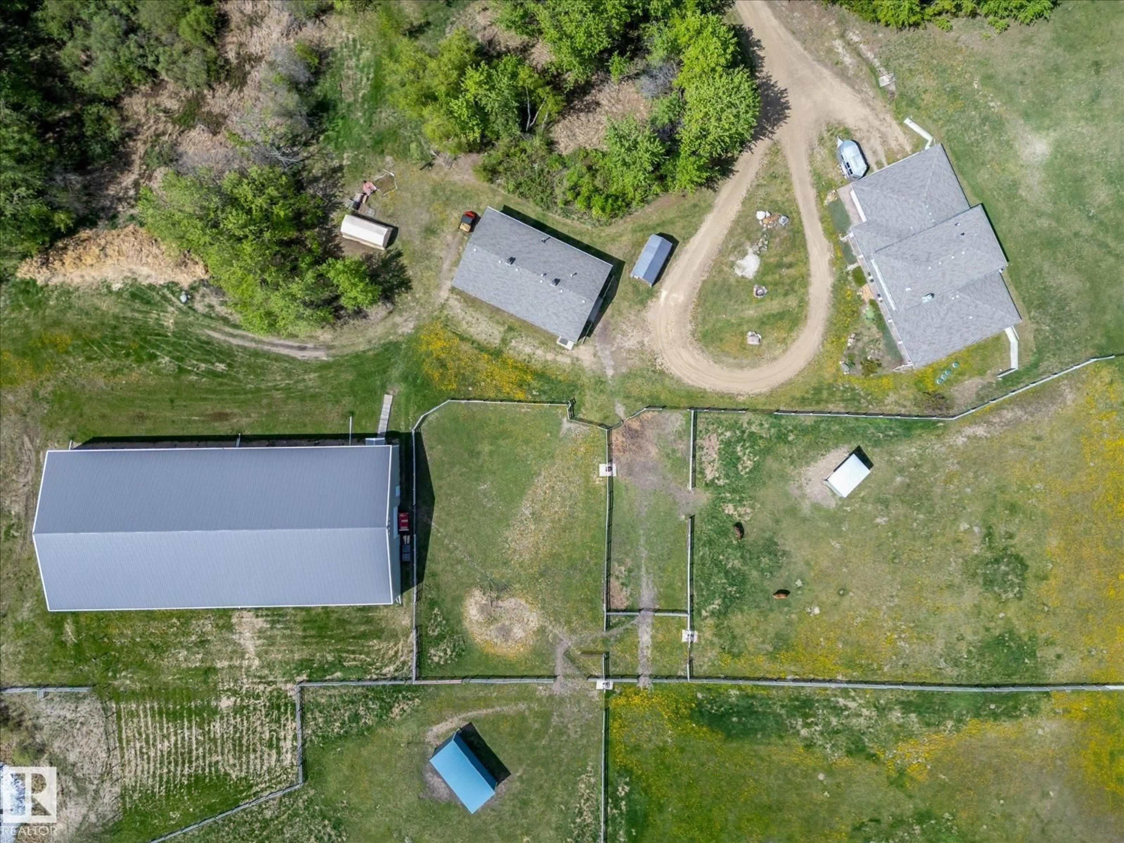 A pic from outside/outdoor area/front of a property/back of a property/a pic from drone, unknown for 21031 TWP ROAD 530, Rural Strathcona County Alberta T8G2C7