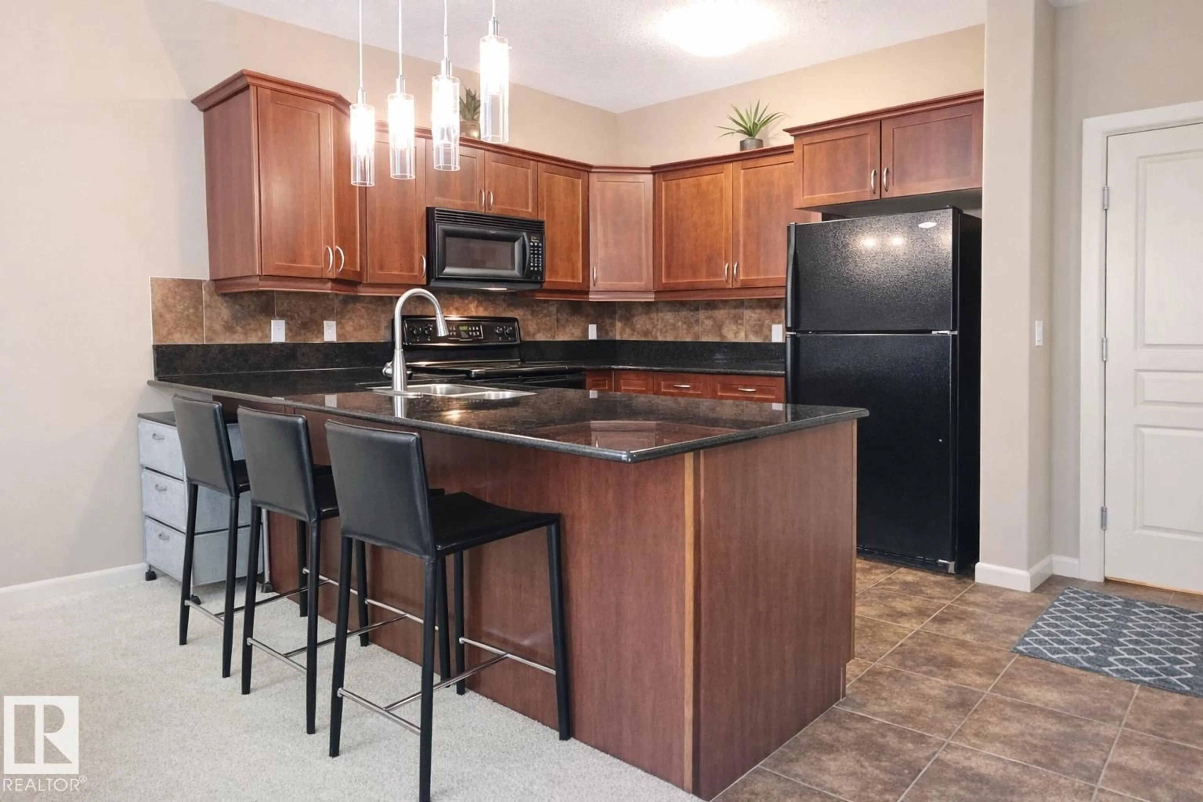 Standard kitchen, ceramic/tile floor for 160 - 117 MAGRATH RD, Edmonton Alberta T6R3T7