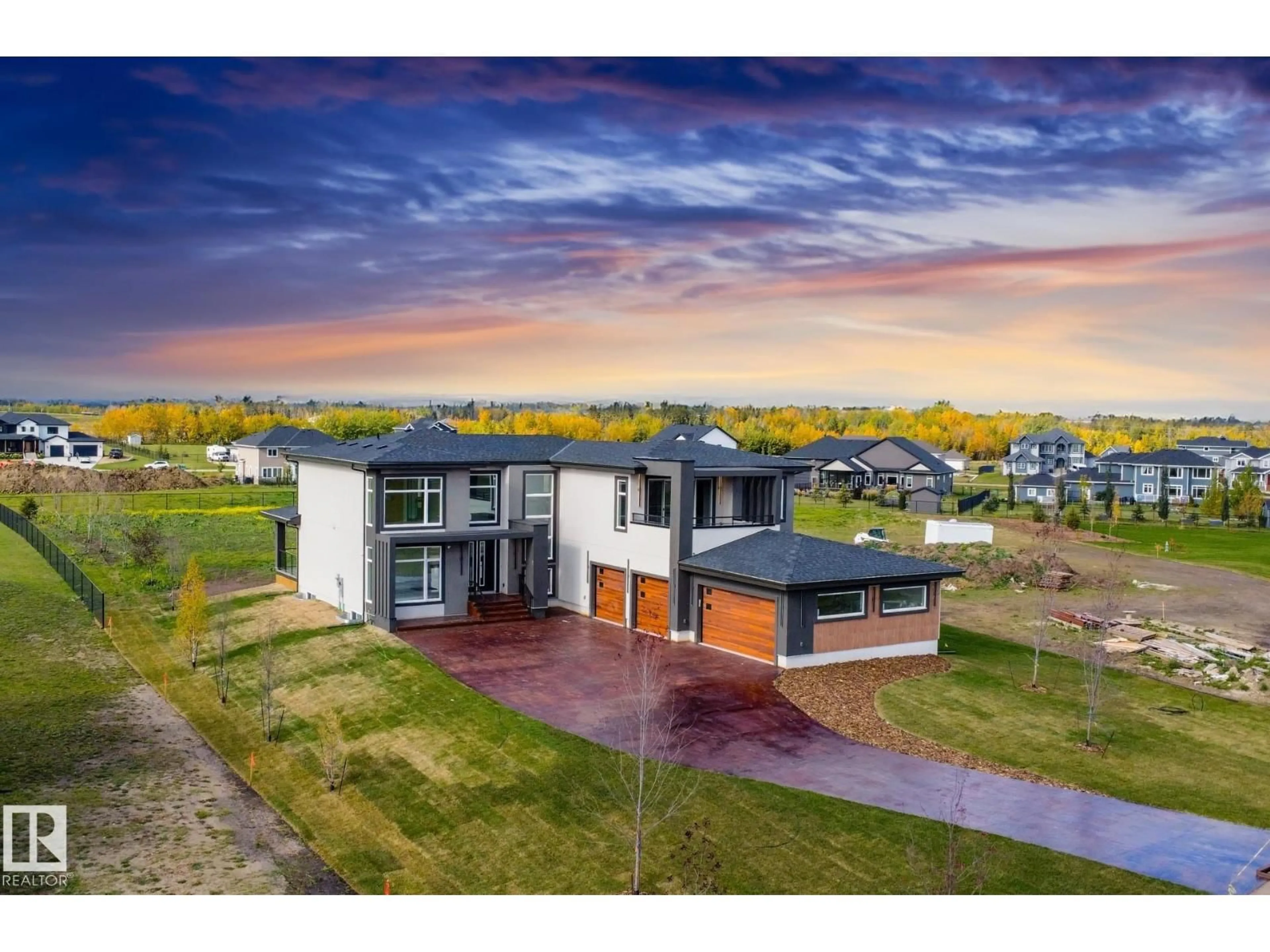 A pic from outside/outdoor area/front of a property/back of a property/a pic from drone, building for 53 26409 TWP RD 532A, Rural Parkland County Alberta T7X0W7