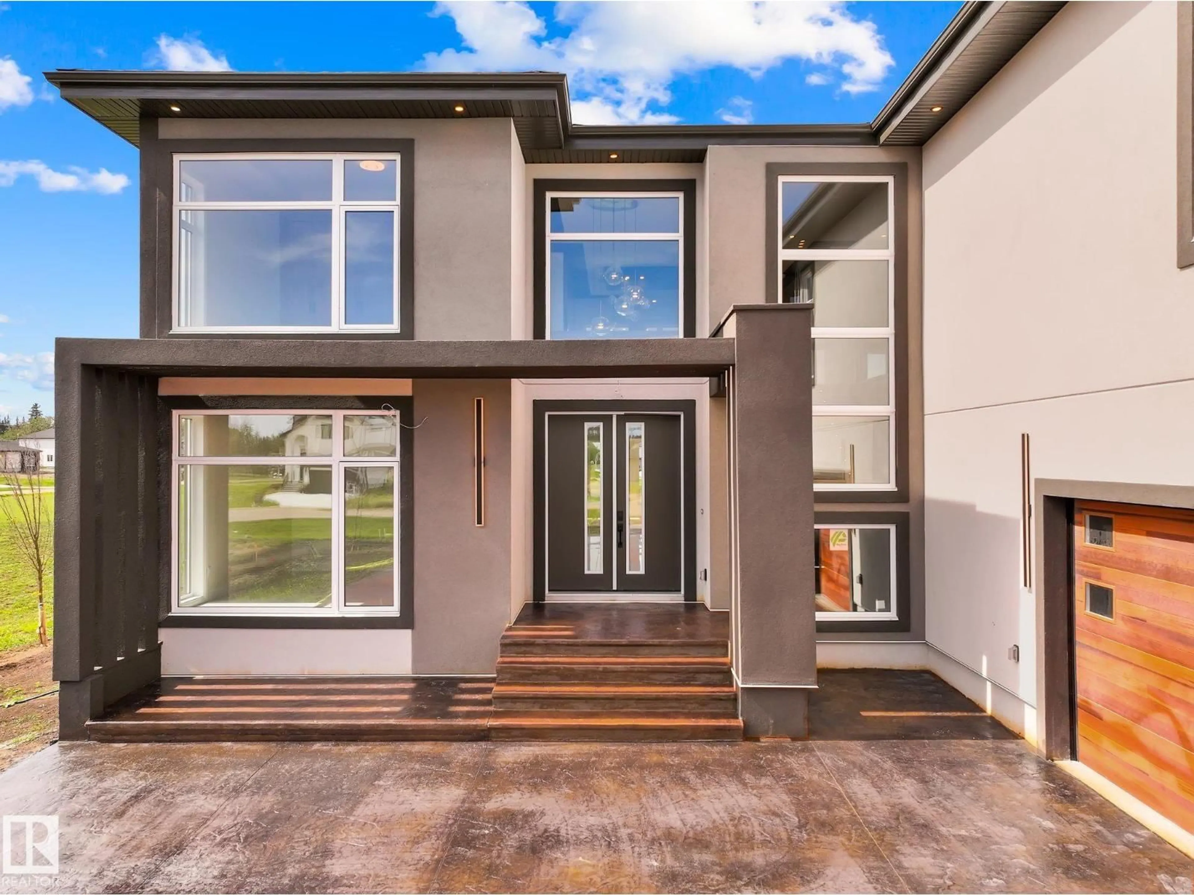 Home with brick exterior material, street for 53 26409 TWP RD 532A, Rural Parkland County Alberta T7X0W7