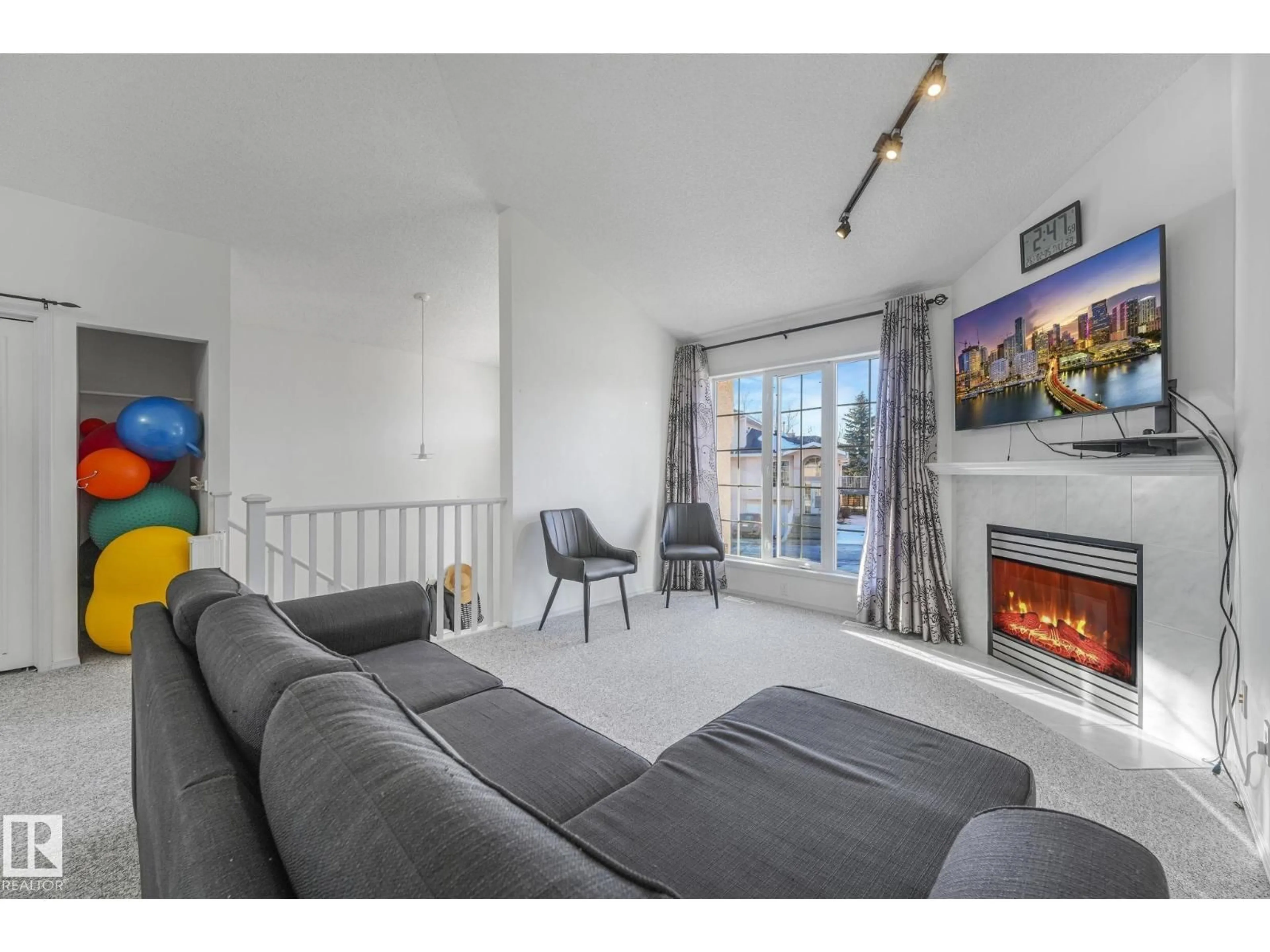 Living room with furniture, unknown for 11105 9 AV, Edmonton Alberta T6J6Z4