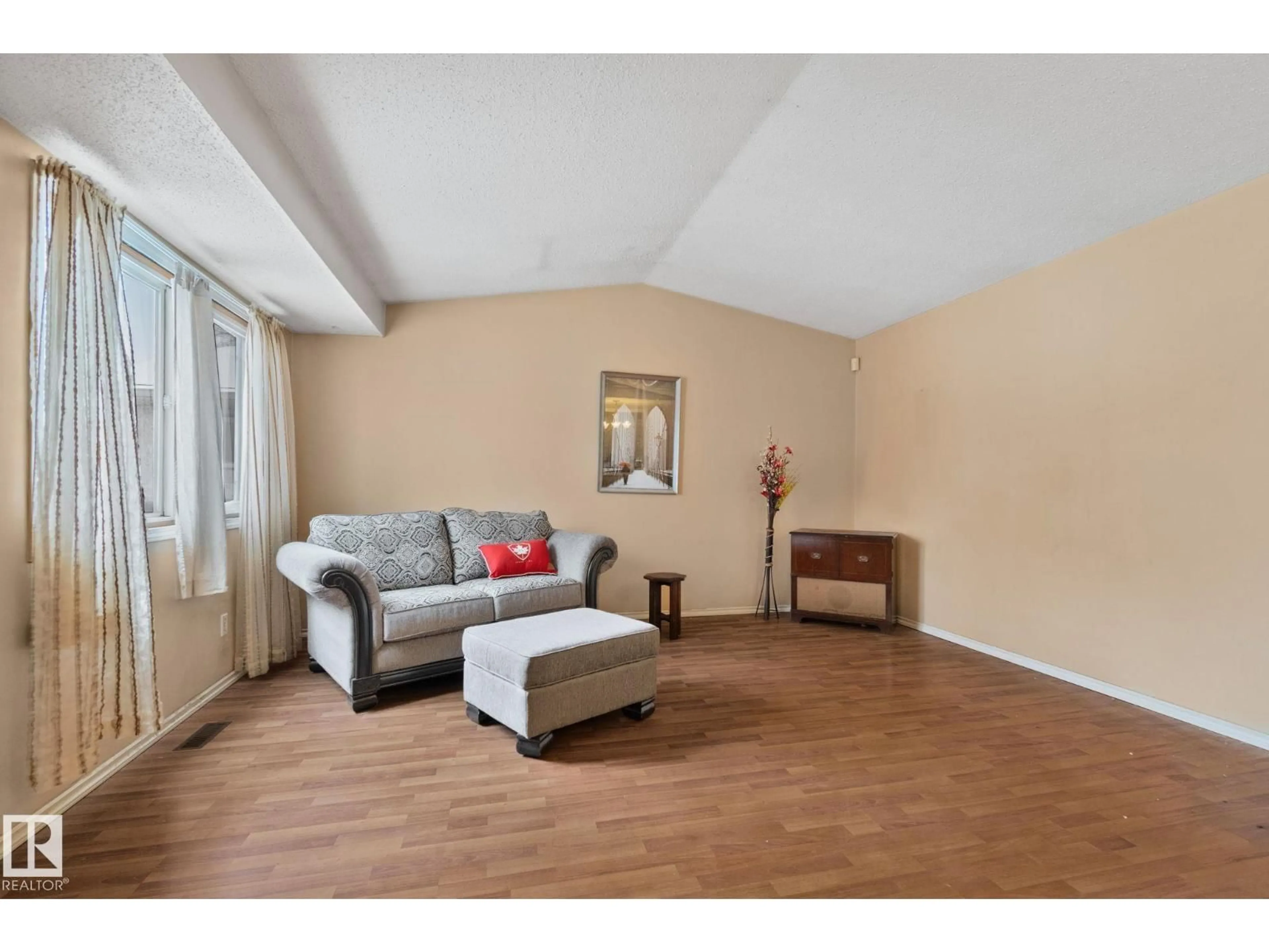 Living room with furniture, wood/laminate floor for NW - 313 WILLOW CO, Edmonton Alberta T5T2K7