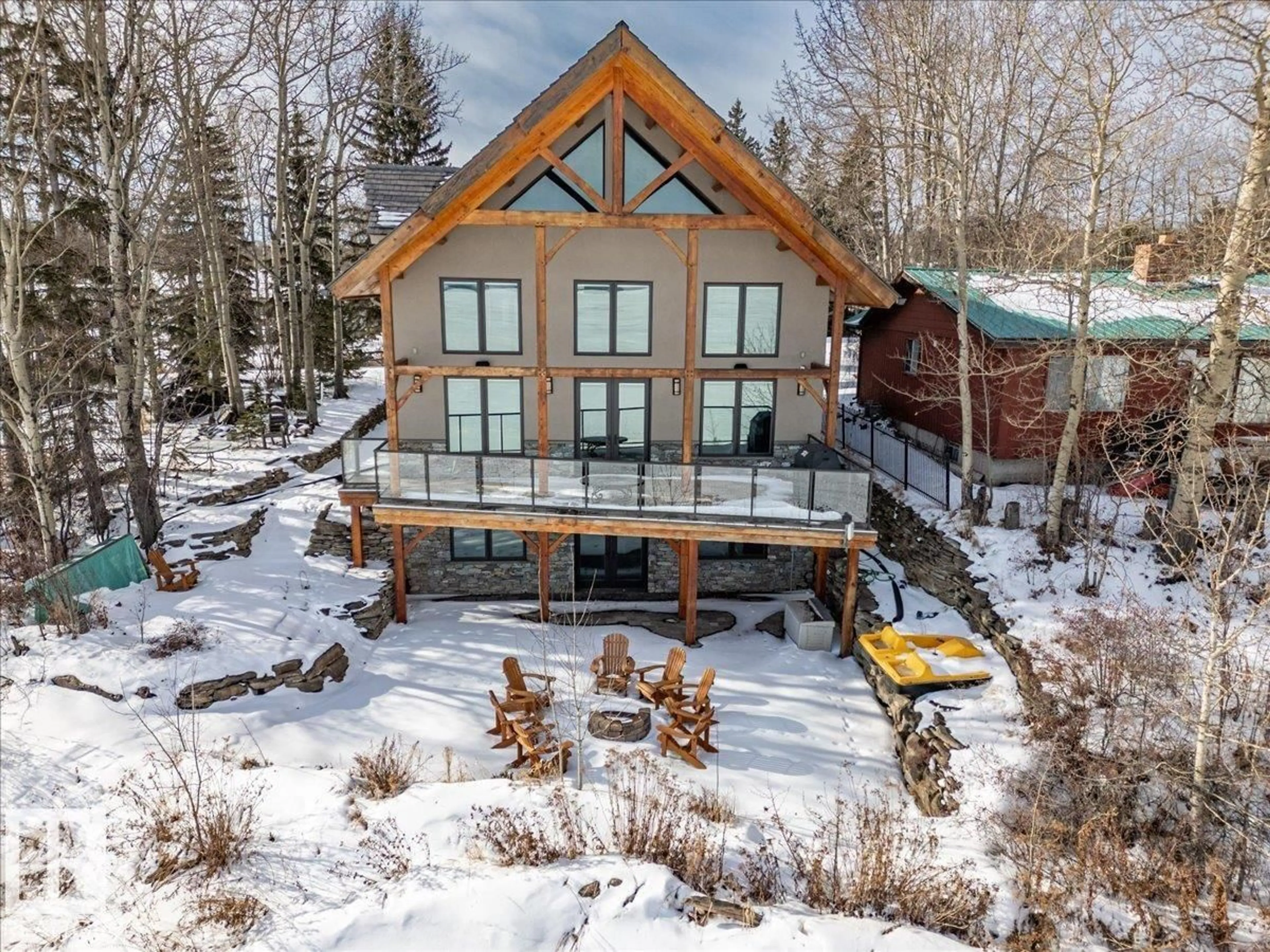 A pic from outside/outdoor area/front of a property/back of a property/a pic from drone, unknown for 451 POPLAR BAY DR, Rural Wetaskiwin County Alberta T0C1X0