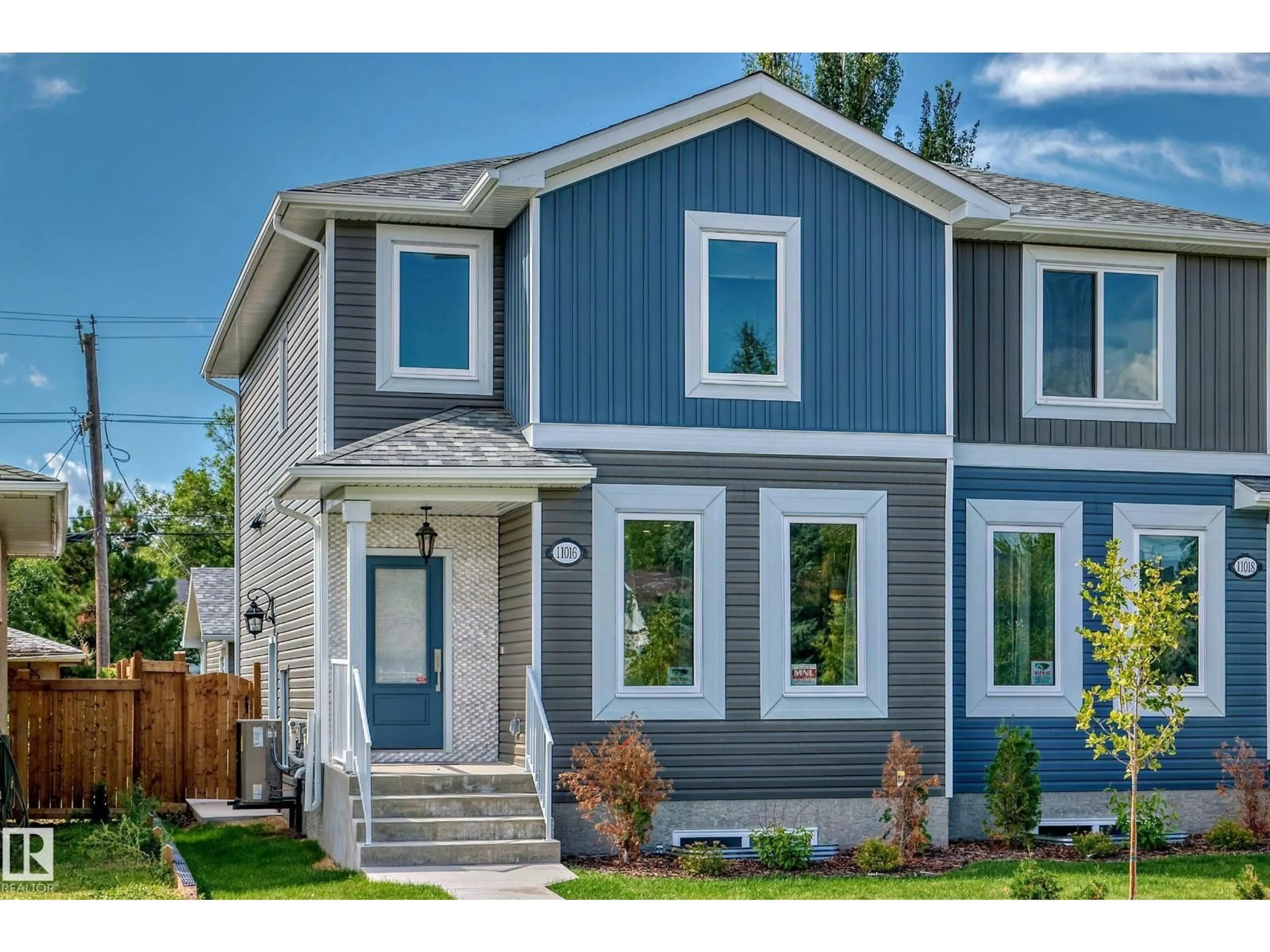 Home with vinyl exterior material, street for NW - 11016 149 ST, Edmonton Alberta T5P1M8