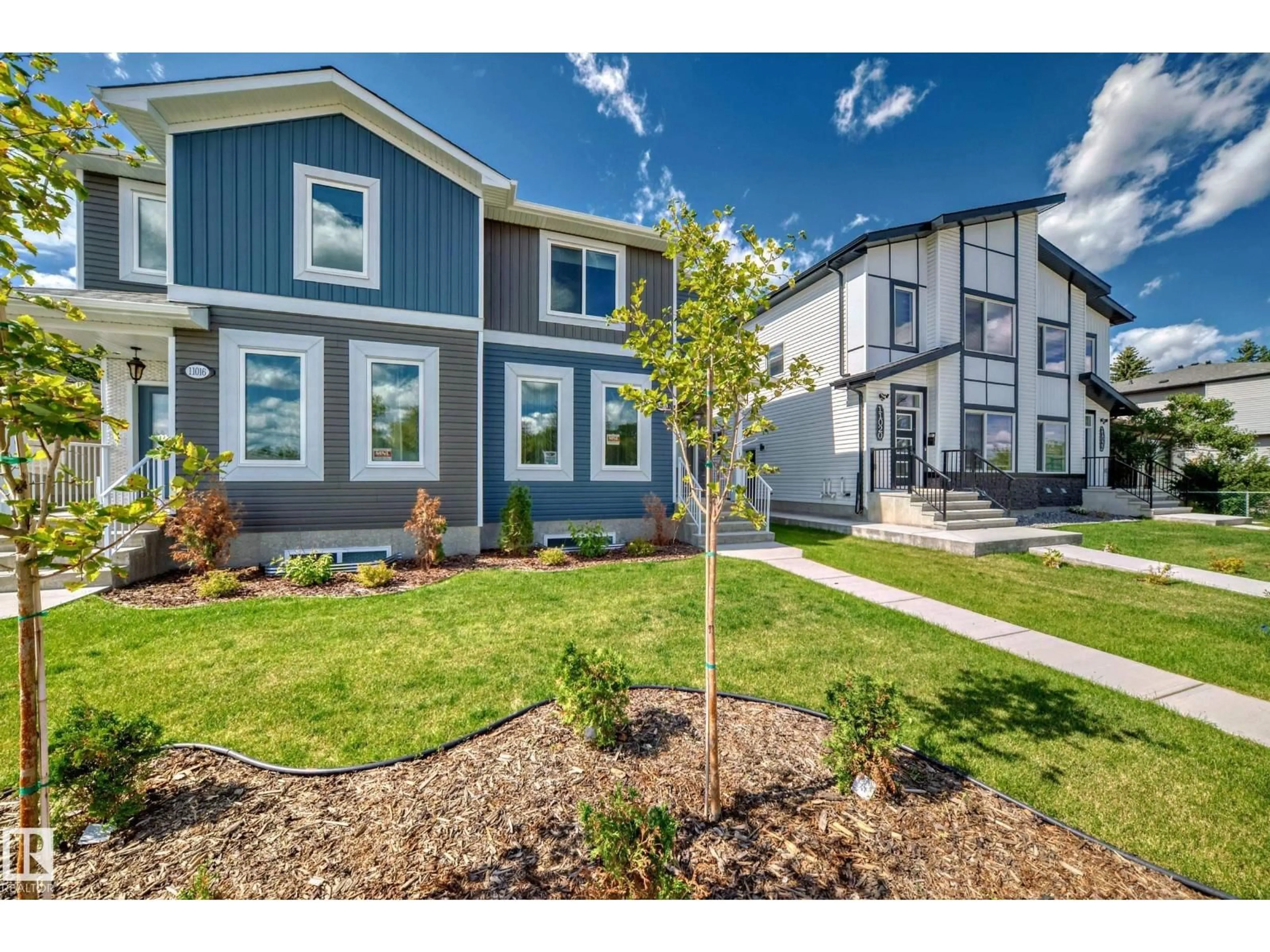 Home with vinyl exterior material, street for NW - 11018 149 ST, Edmonton Alberta T5P1M8