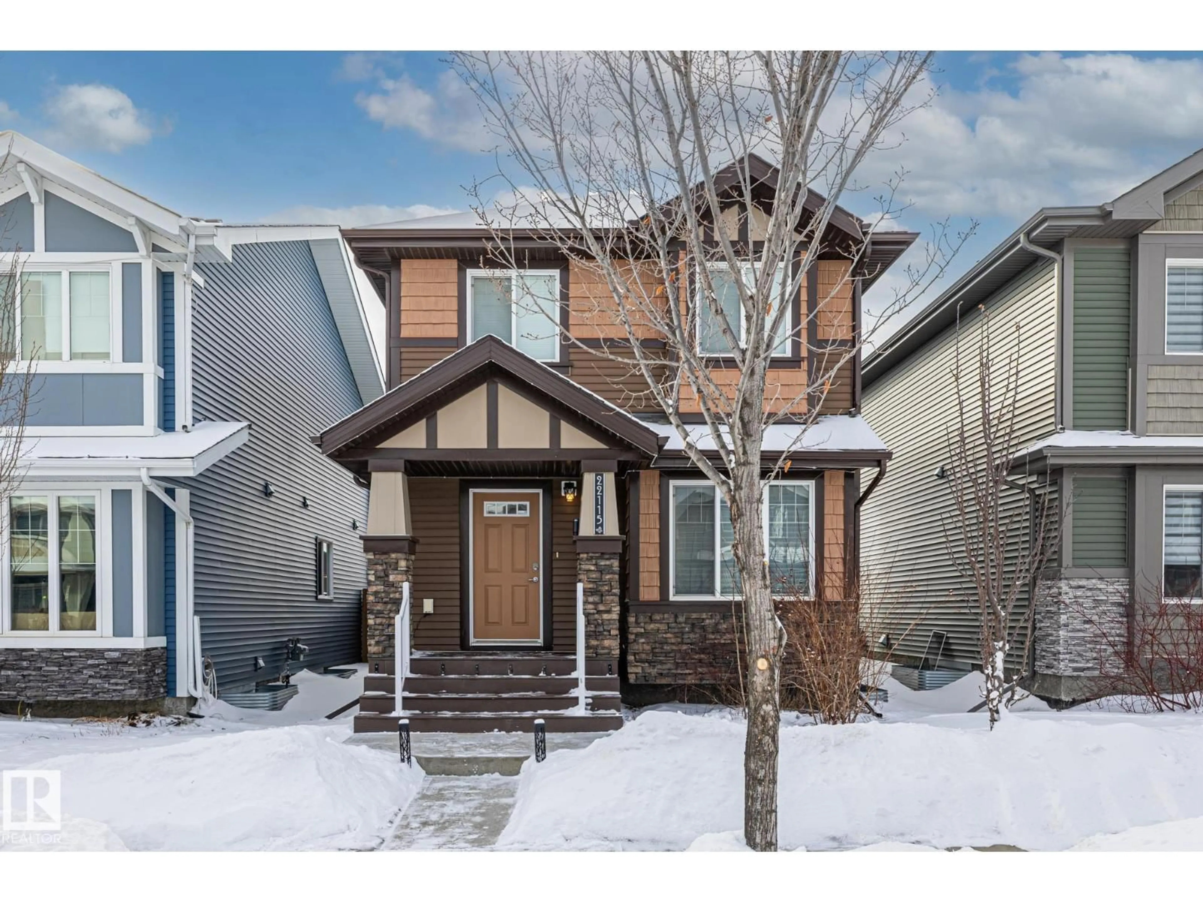 Home with brick exterior material, street for NW - 22115 88 AV, Edmonton Alberta T5T7H3