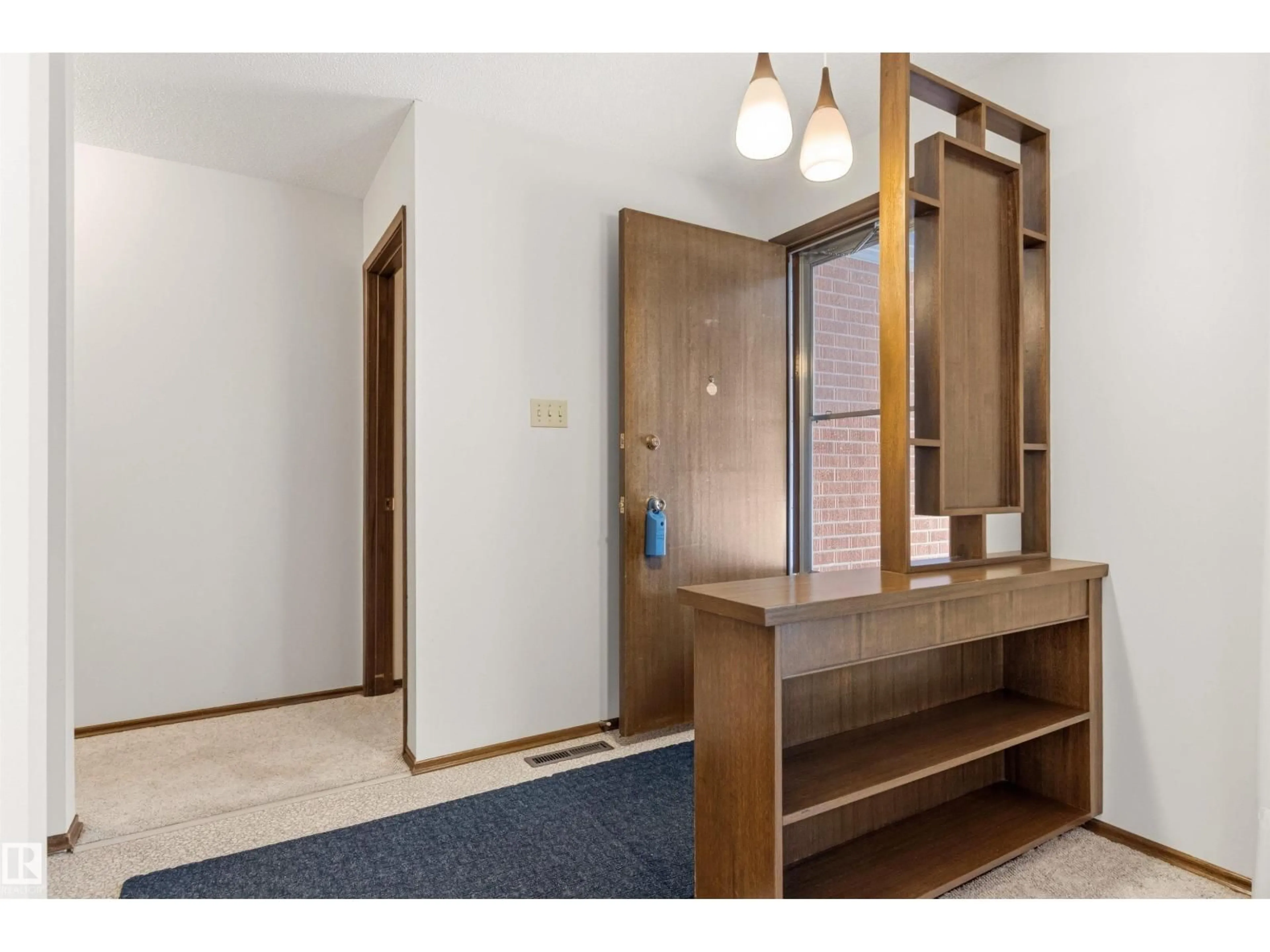 Indoor foyer for NW - 11323 35A AV, Edmonton Alberta T6J0A7