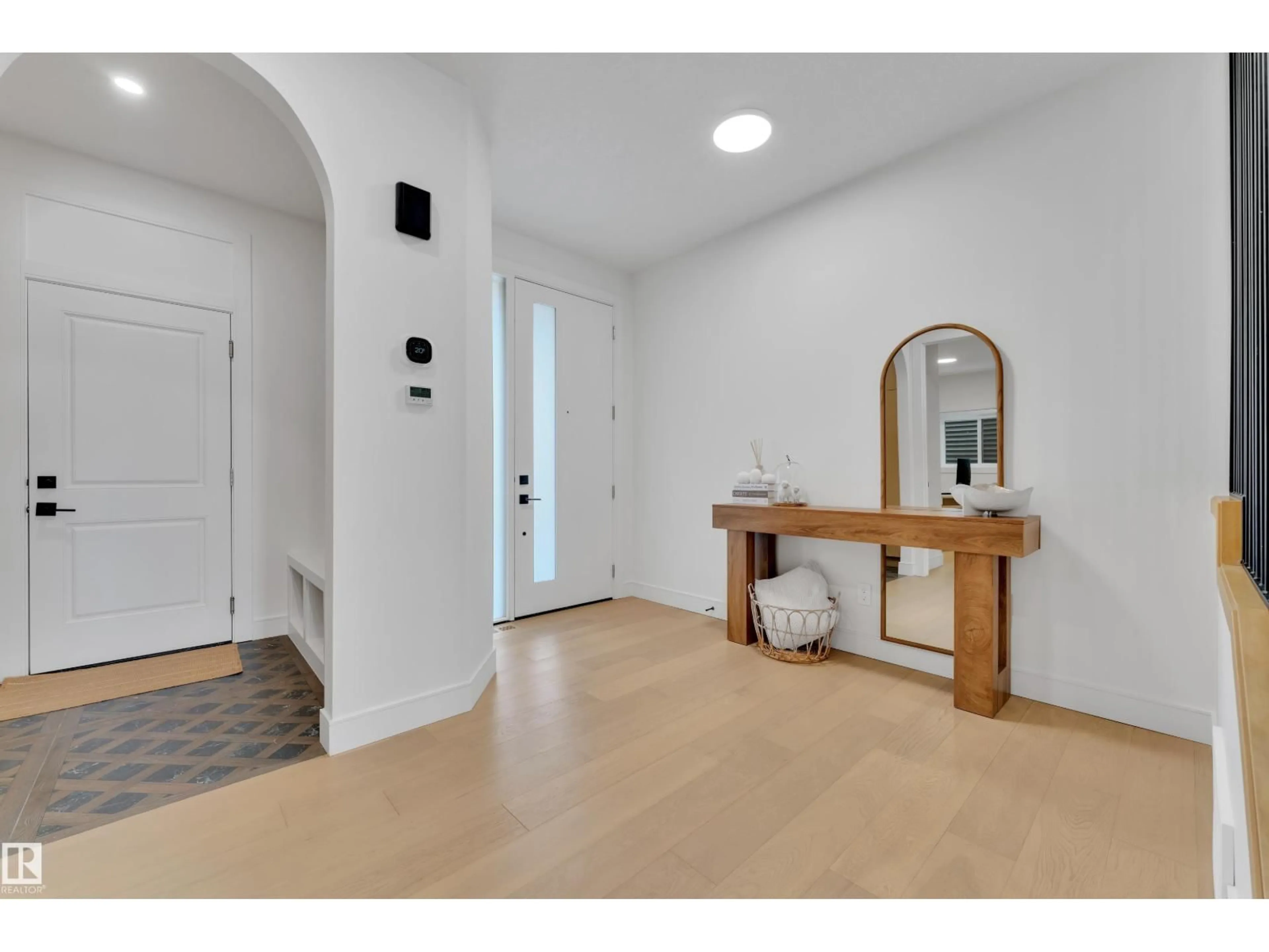 Indoor entryway for 2408 1 AVE SW, Edmonton Alberta T6X3E2