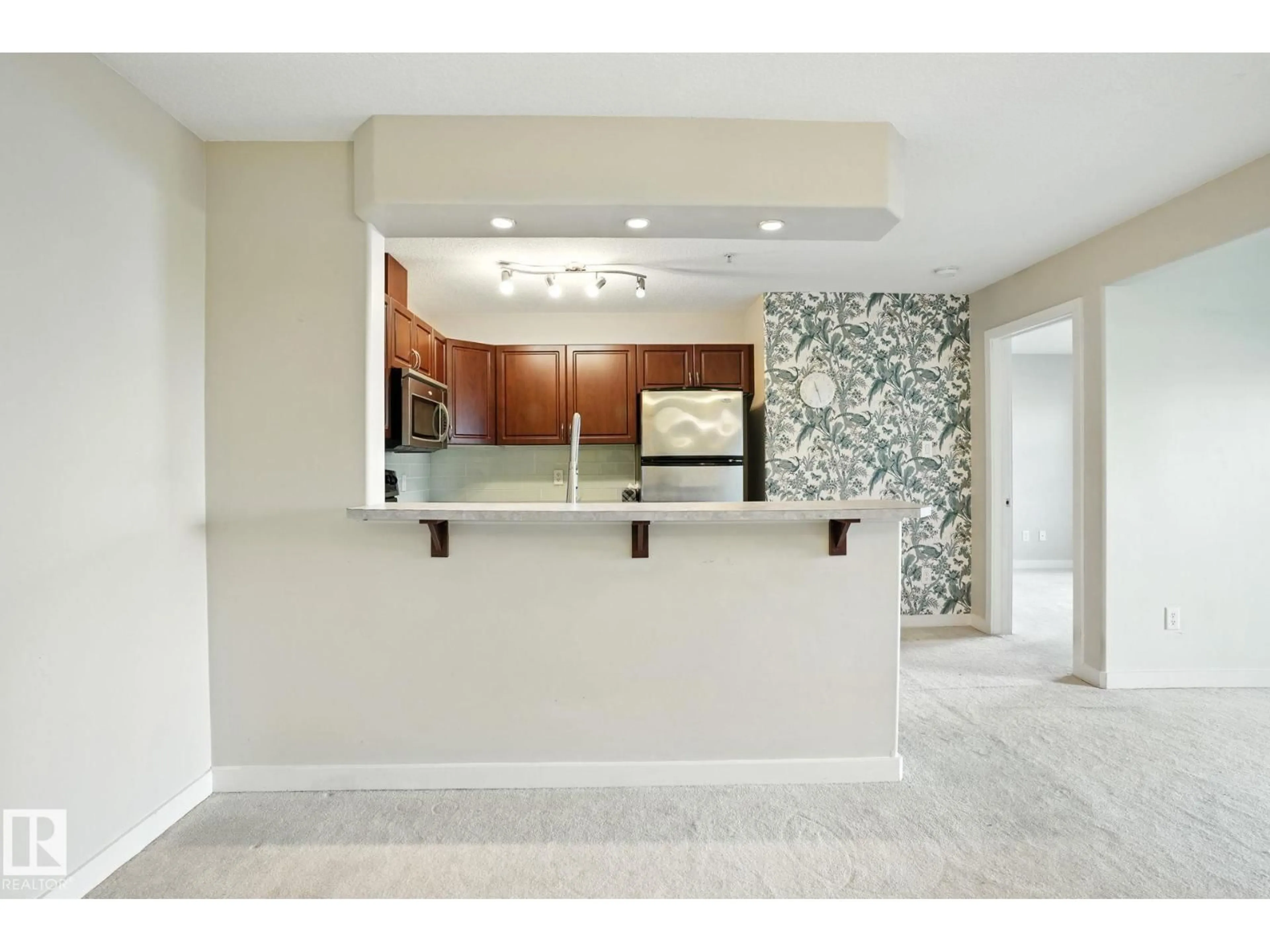 Open concept kitchen, ceramic/tile floor for #113 - 11615 ELLERSLIE RD, Edmonton Alberta T6W0J3