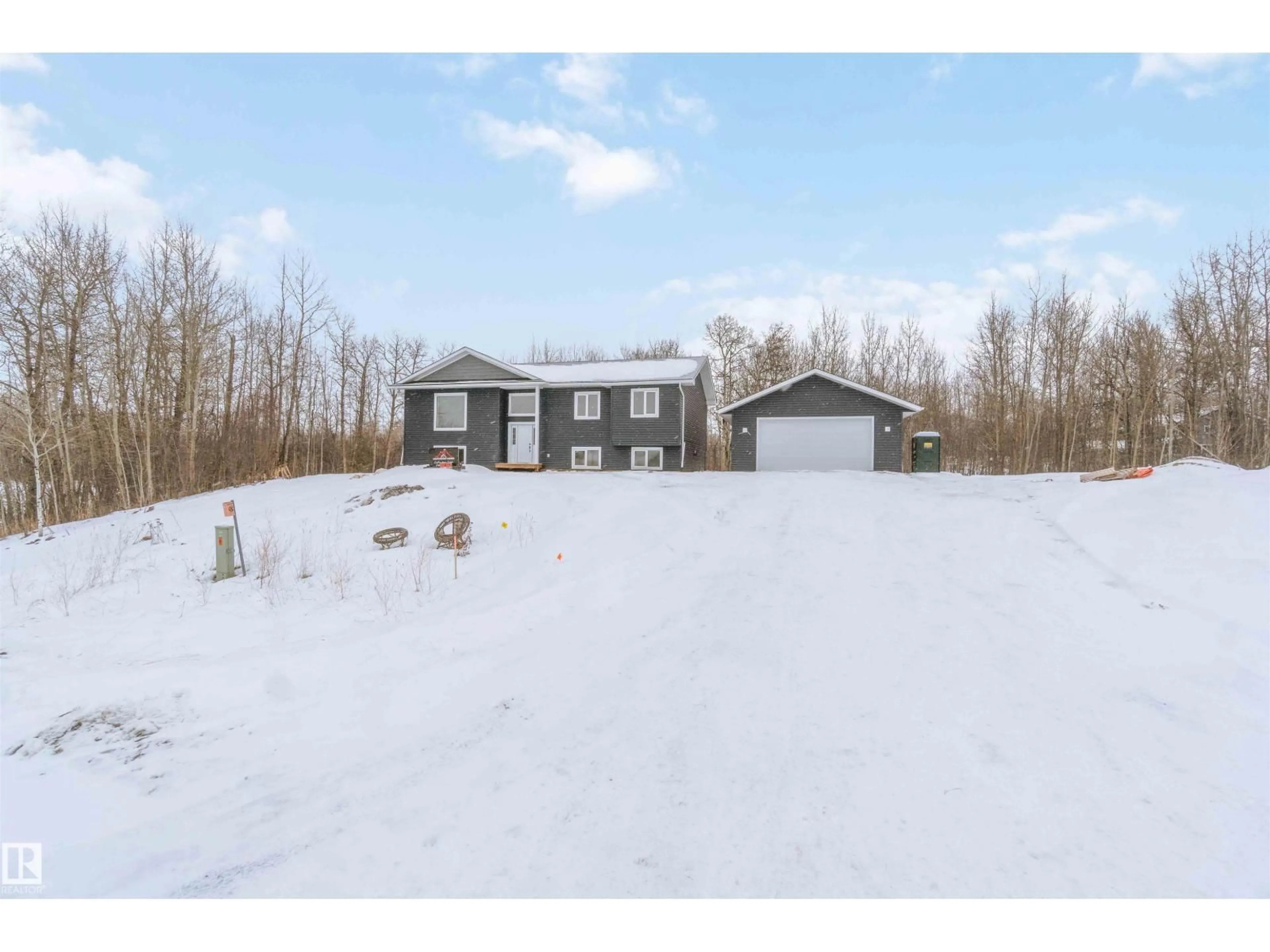 A pic from outside/outdoor area/front of a property/back of a property/a pic from drone, unknown for 54419 - 201 RGE ROAD 14, Rural Lac Ste. Anne County Alberta T0E1V2
