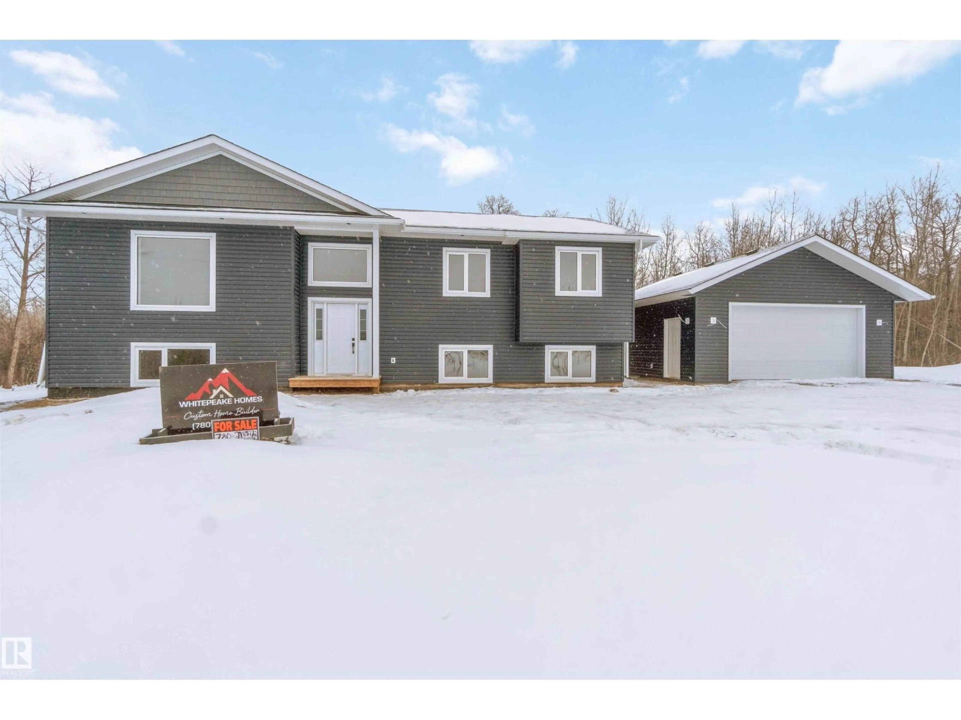 Home with vinyl exterior material, street for 54419 - 201 RGE ROAD 14, Rural Lac Ste. Anne County Alberta T0E1V2