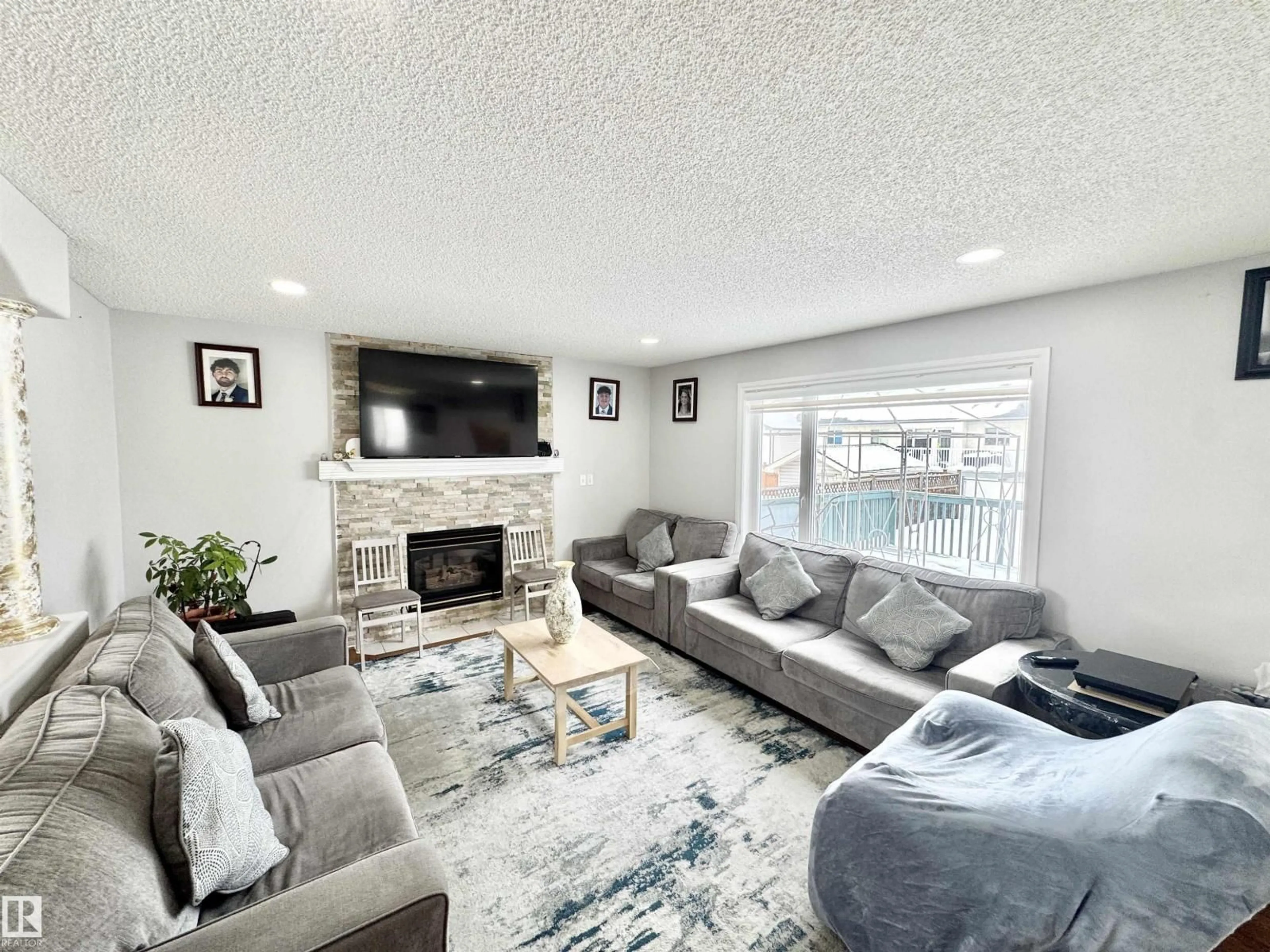 Living room with furniture, unknown for 6734 162A AV, Edmonton Alberta T5Z2C6