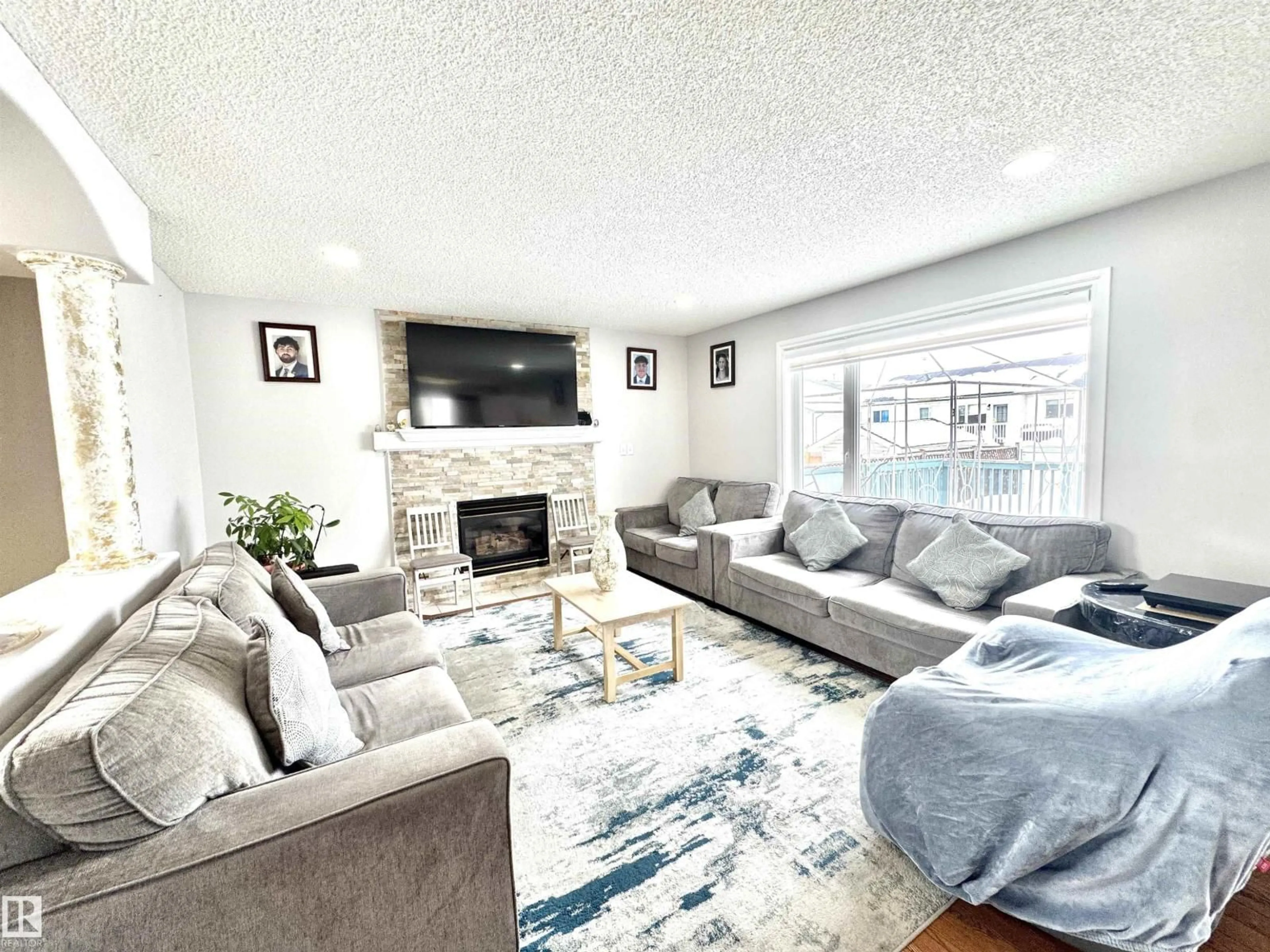 Living room with furniture, unknown for 6734 162A AV, Edmonton Alberta T5Z2C6