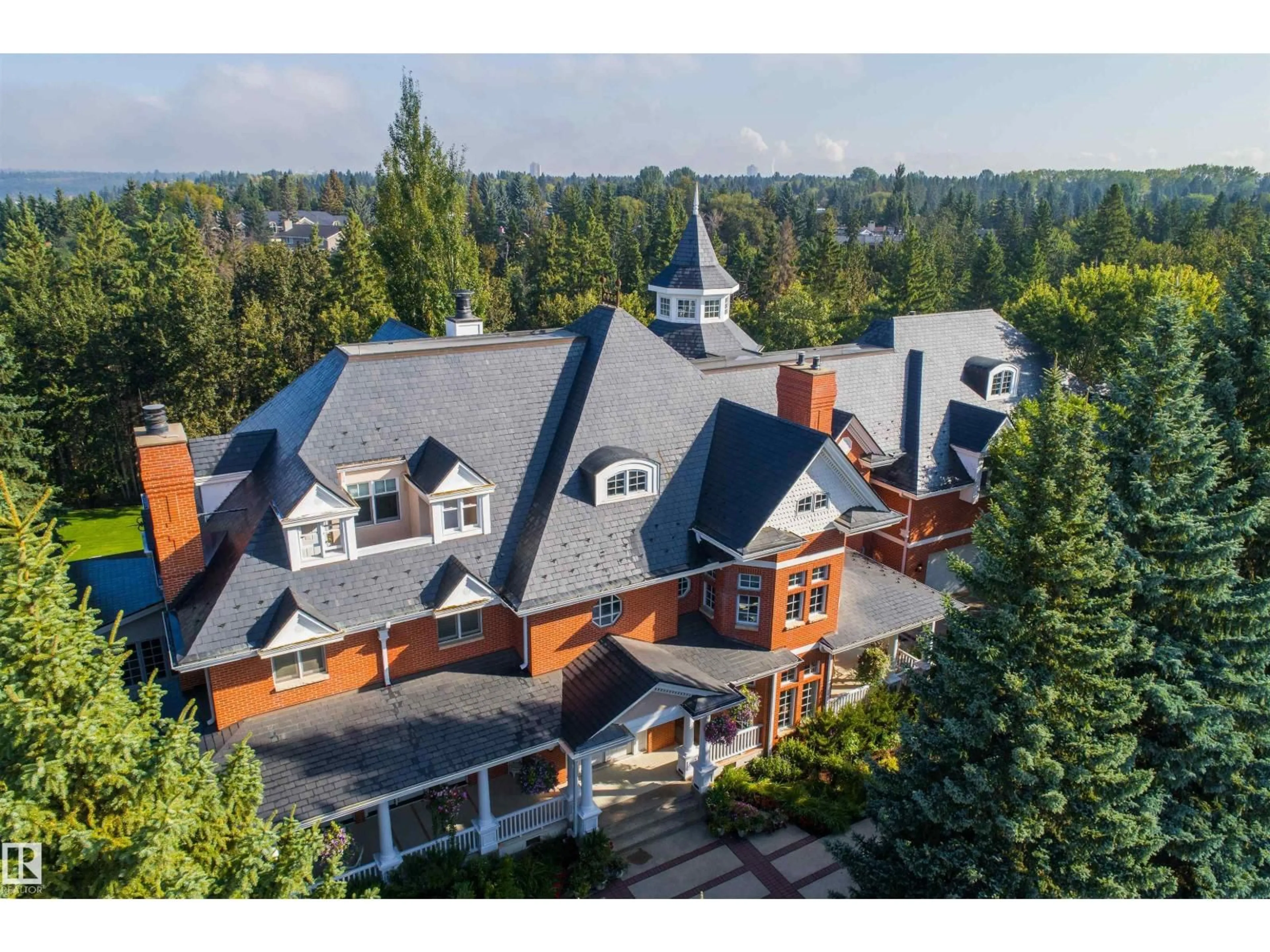 A pic from outside/outdoor area/front of a property/back of a property/a pic from drone, mountain view for 108 WESTBROOK DR, Edmonton Alberta T6J2E1