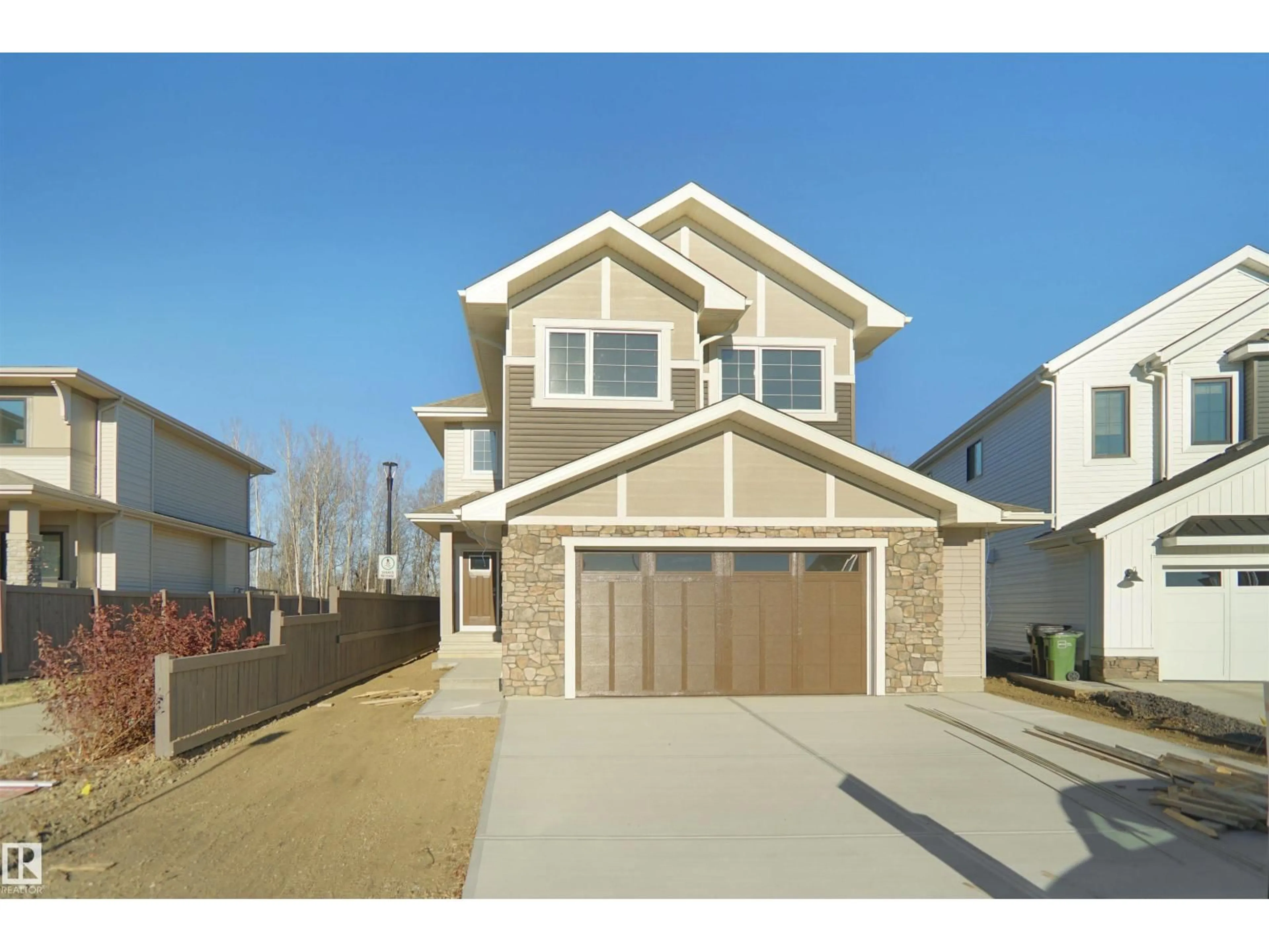 Home with vinyl exterior material, street for 20608 27 AV, Edmonton Alberta T6M1P2