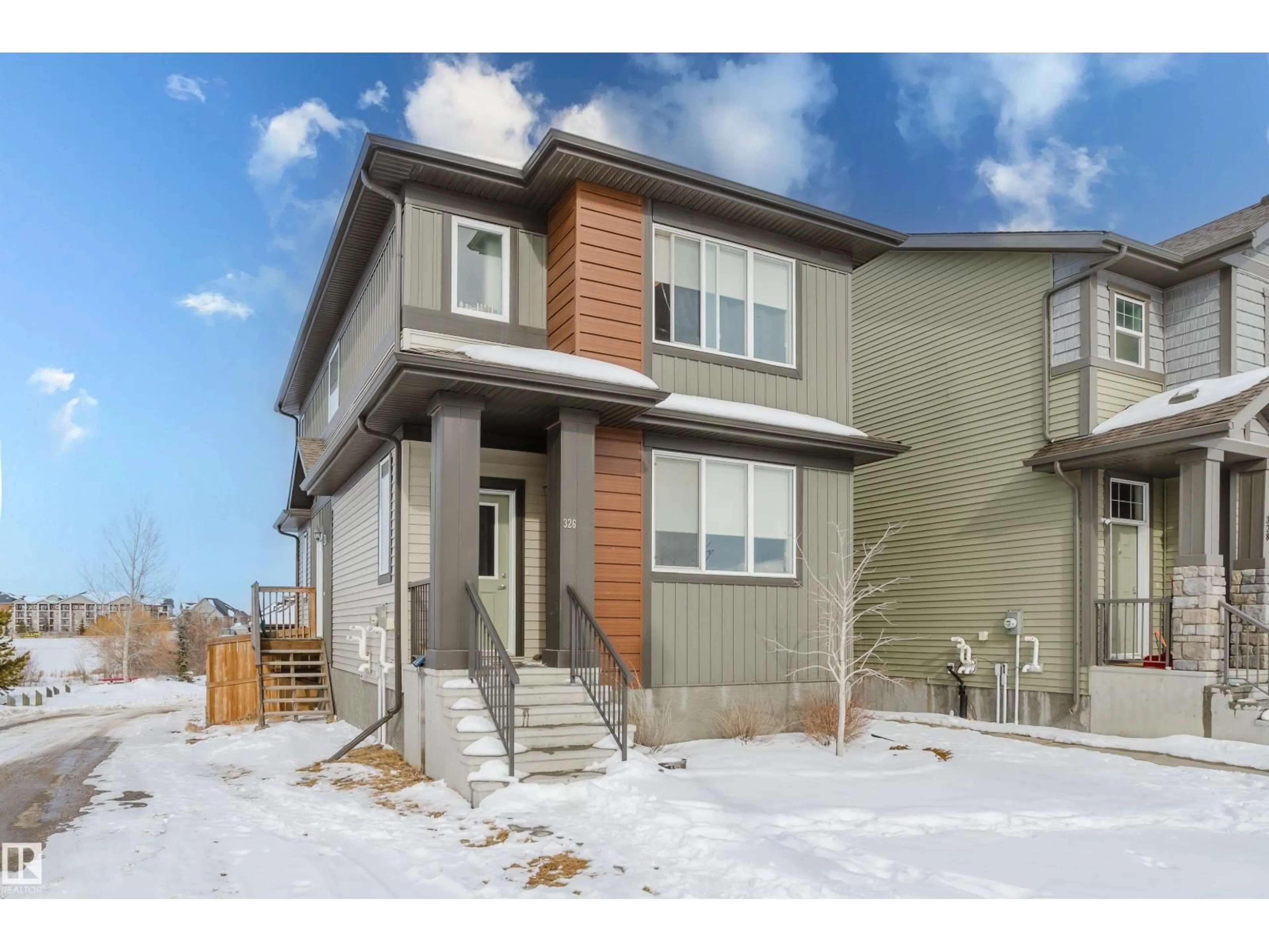 Home with vinyl exterior material, street for 326 HAVEN DR, Leduc Alberta T9E1J2