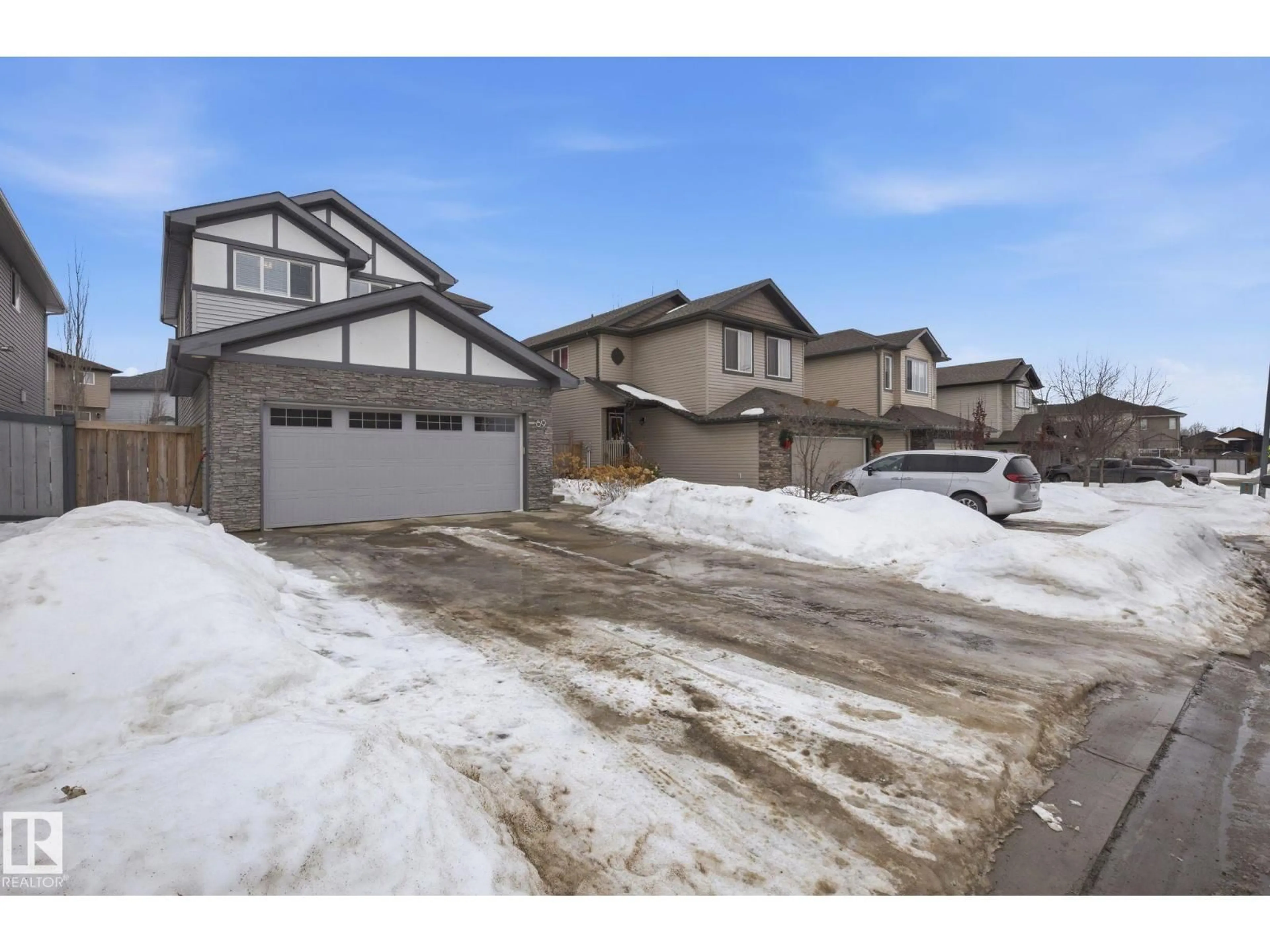 A pic from outside/outdoor area/front of a property/back of a property/a pic from drone, street for 69 AVONLEA WY, Spruce Grove Alberta T7X0H8