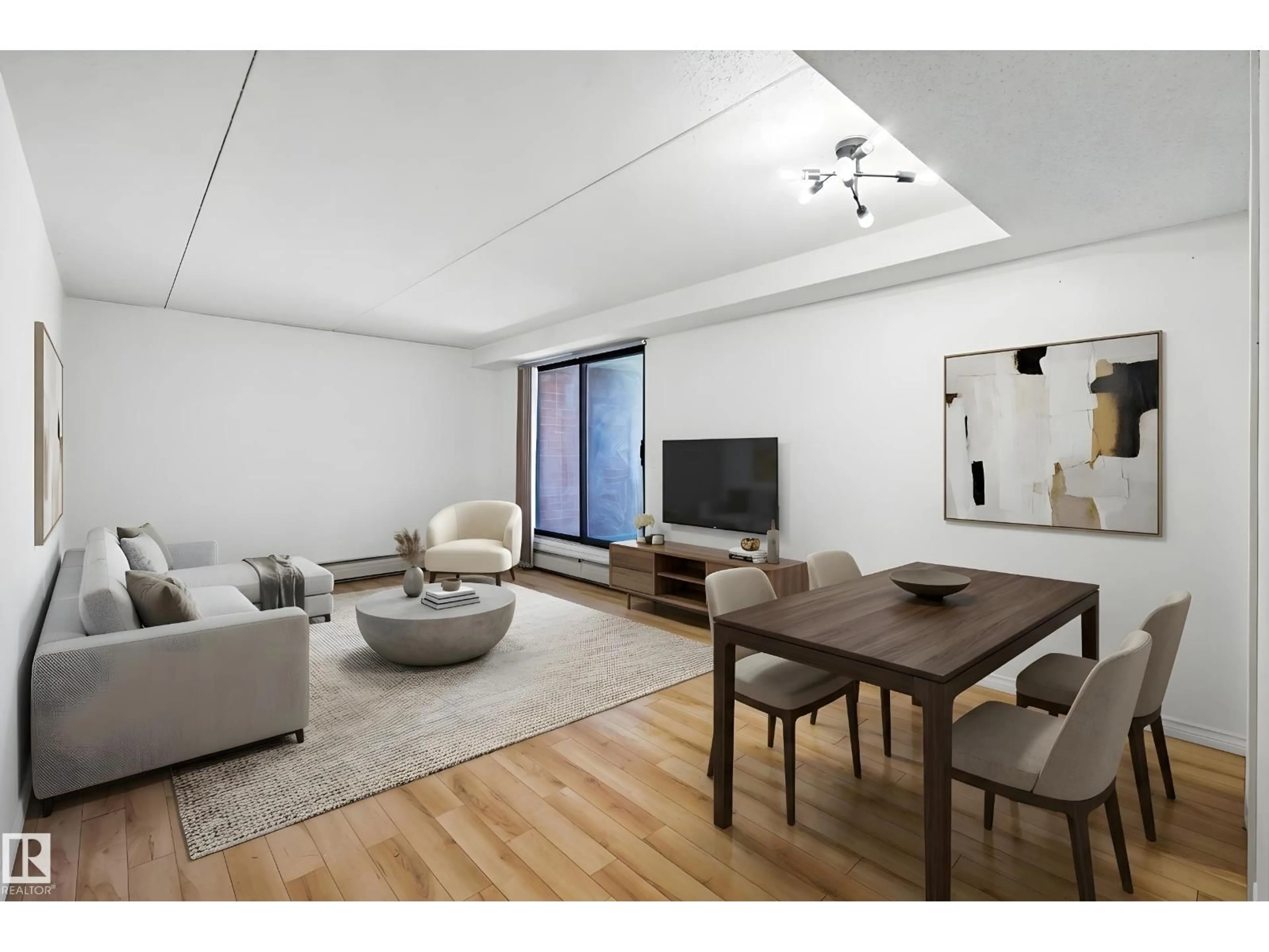 Living room with furniture, wood/laminate floor for 9917 - 1106 110 ST, Edmonton Alberta T5K2N4