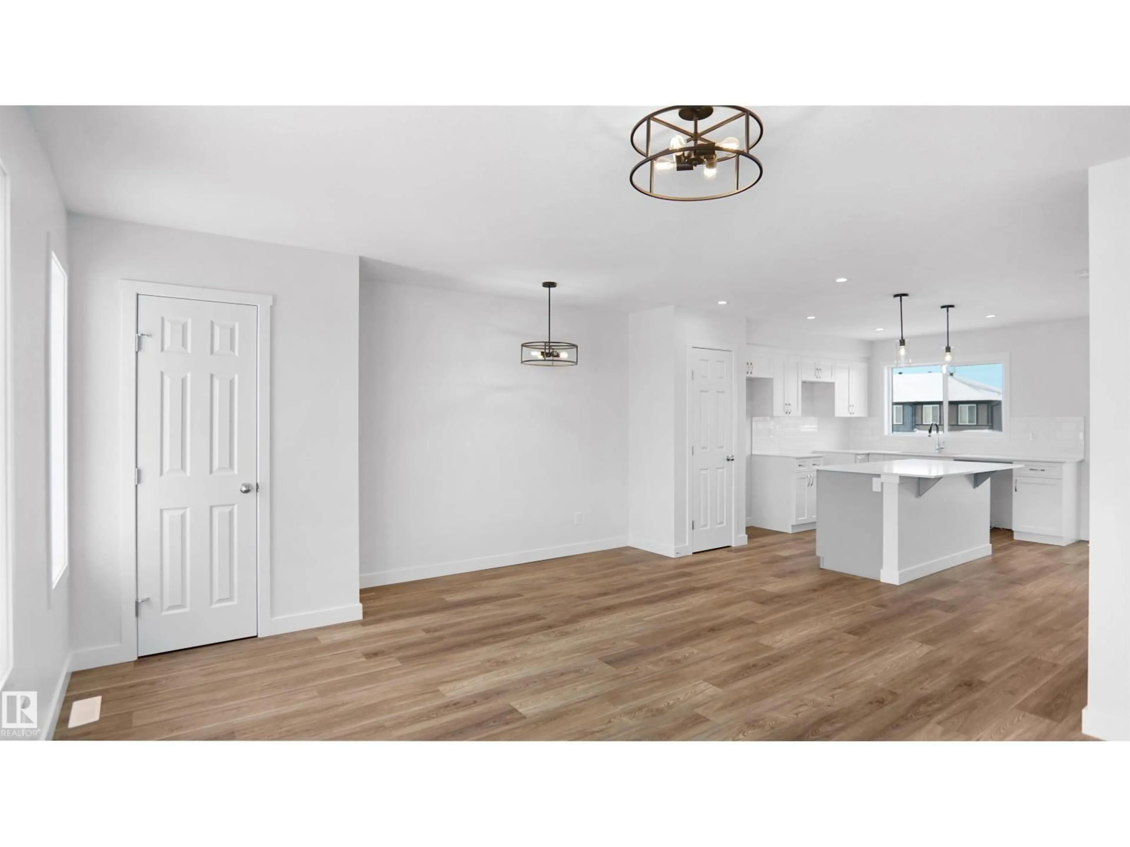 Open concept kitchen, wood/laminate floor for 924 19 AV, Edmonton Alberta T6T1J1
