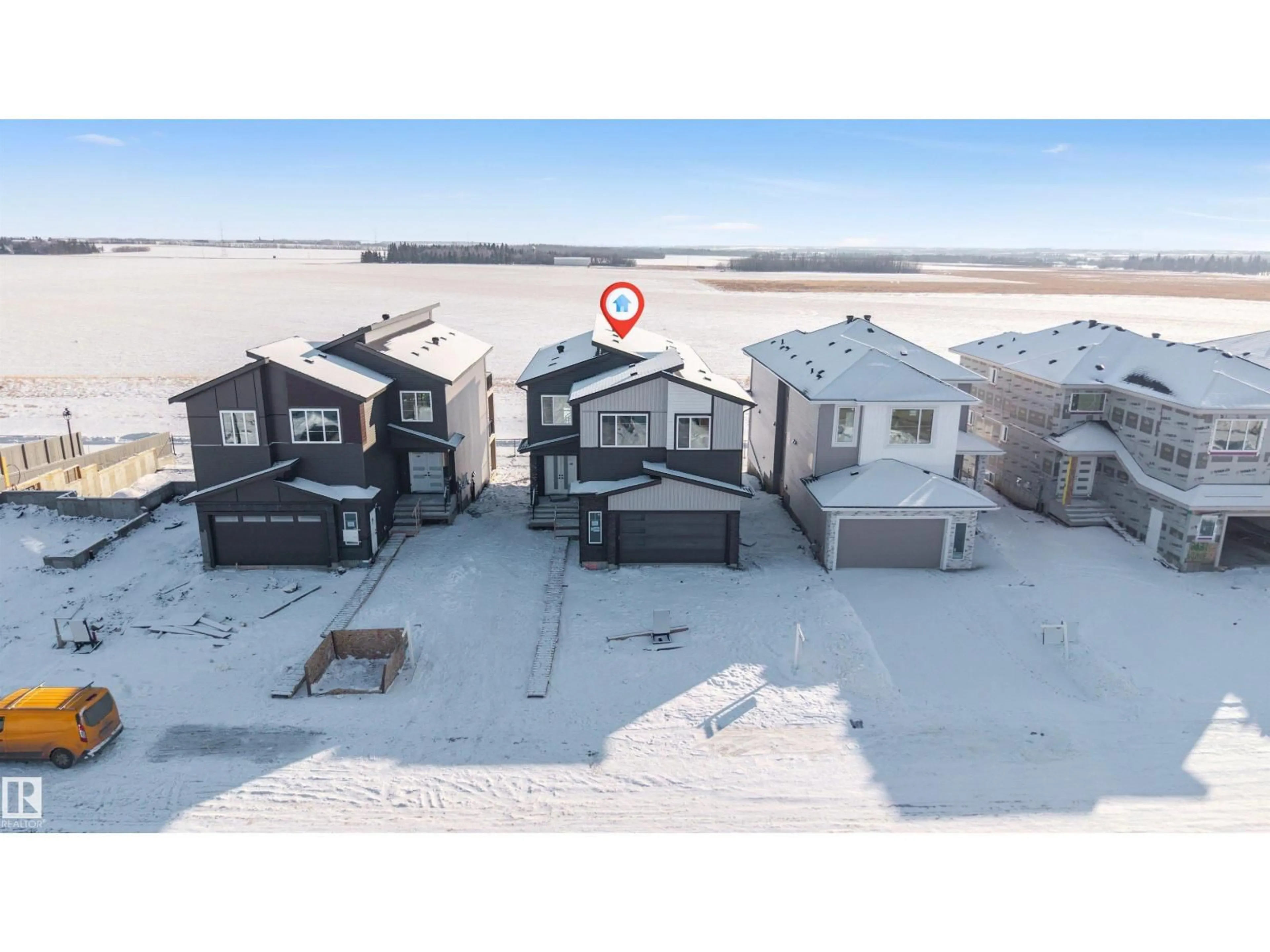 A pic from outside/outdoor area/front of a property/back of a property/a pic from drone, water/lake/river/ocean view for 2705 64 AV, Rural Leduc County Alberta T4X2C1