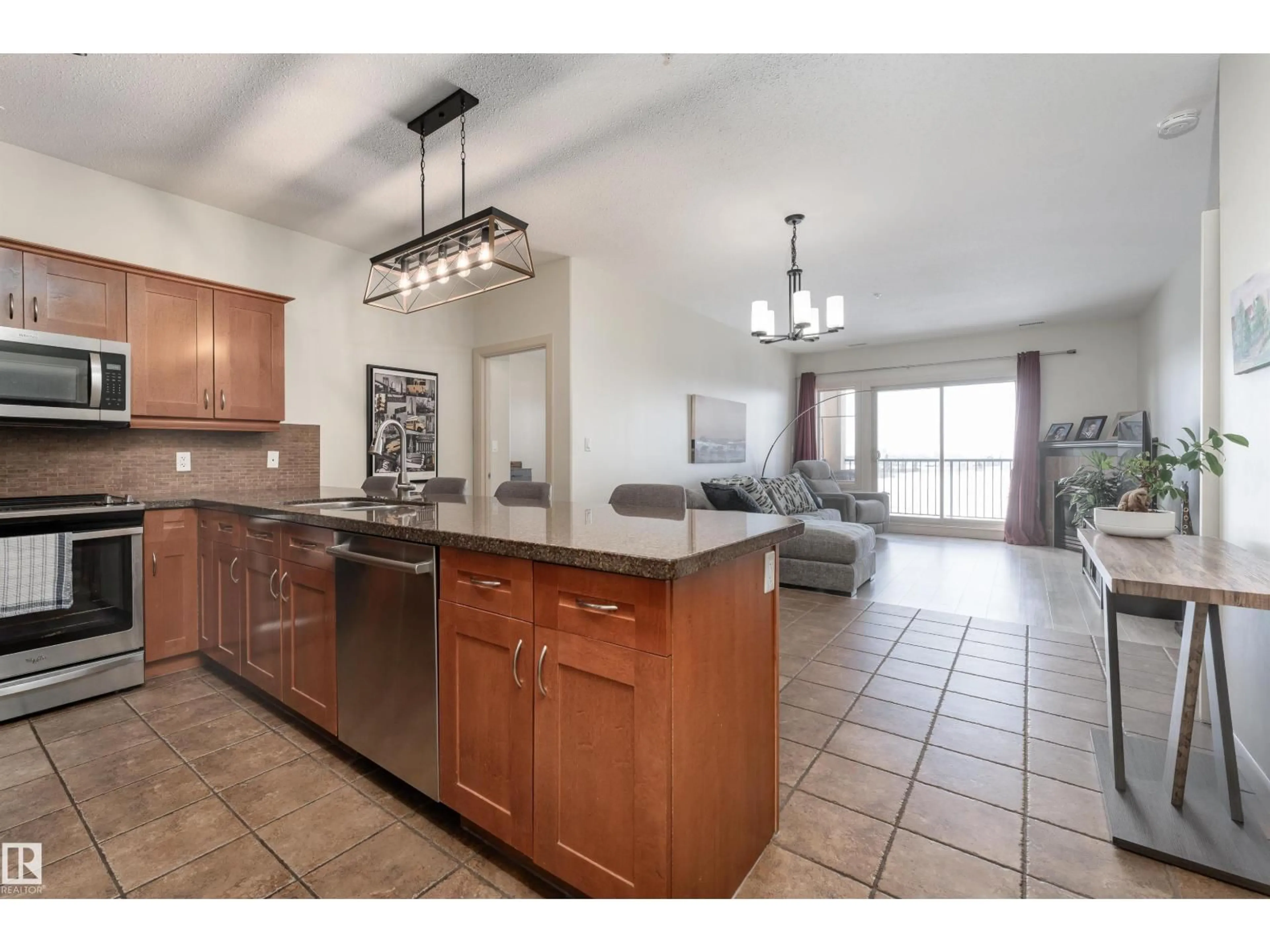Open concept kitchen, ceramic/tile floor for 415 - 400 PALISADES WY, Sherwood Park Alberta T8H0H4