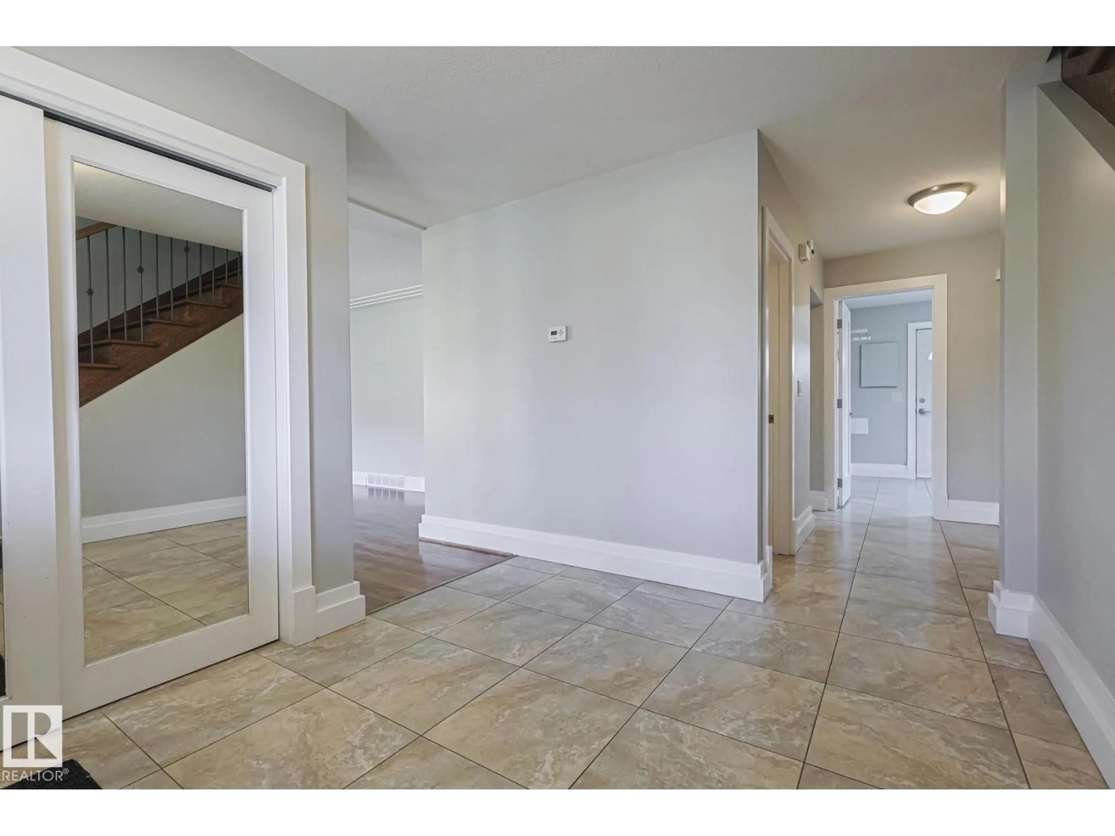 Indoor foyer for 8907 140 ST, Edmonton Alberta T5R0J1
