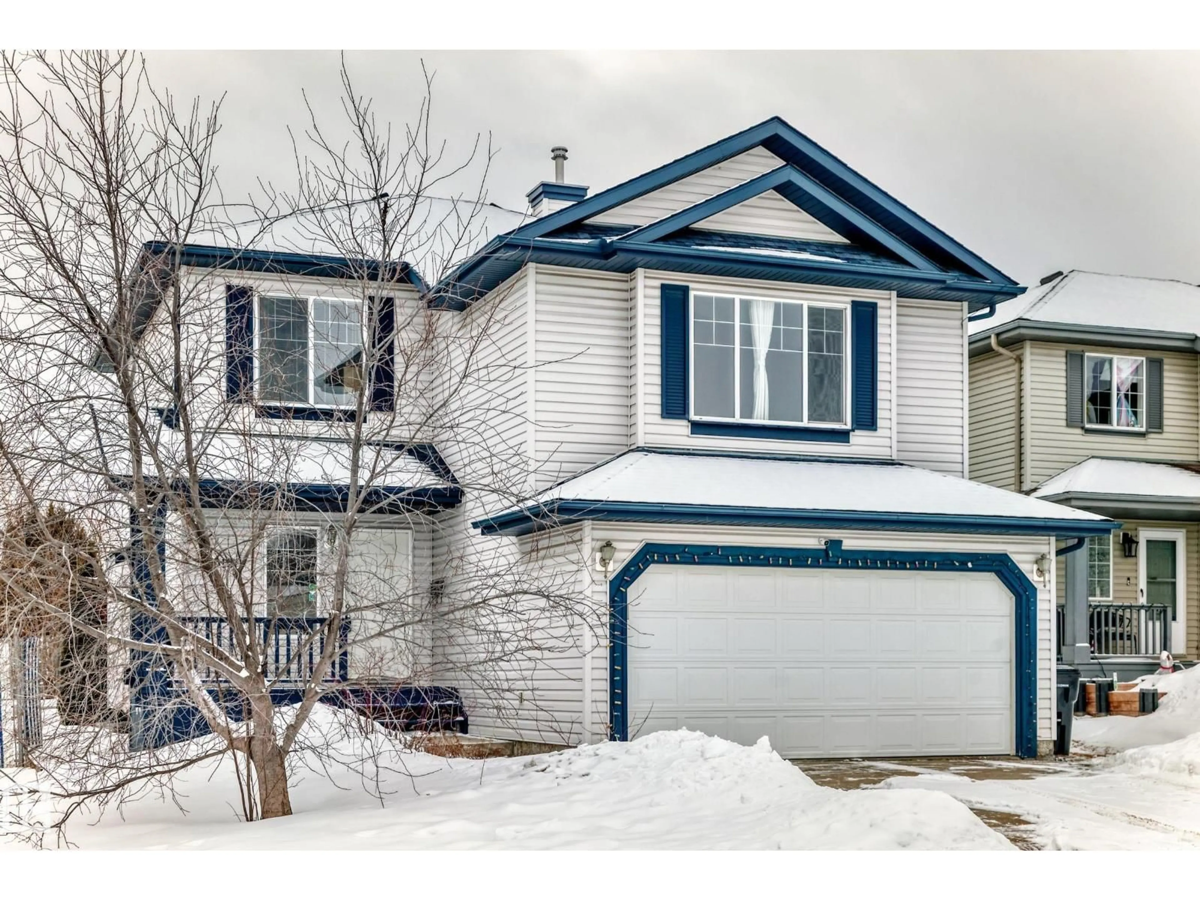 Home with vinyl exterior material, street for S NW - 4619 151 AV, Edmonton Alberta T5Y3A1
