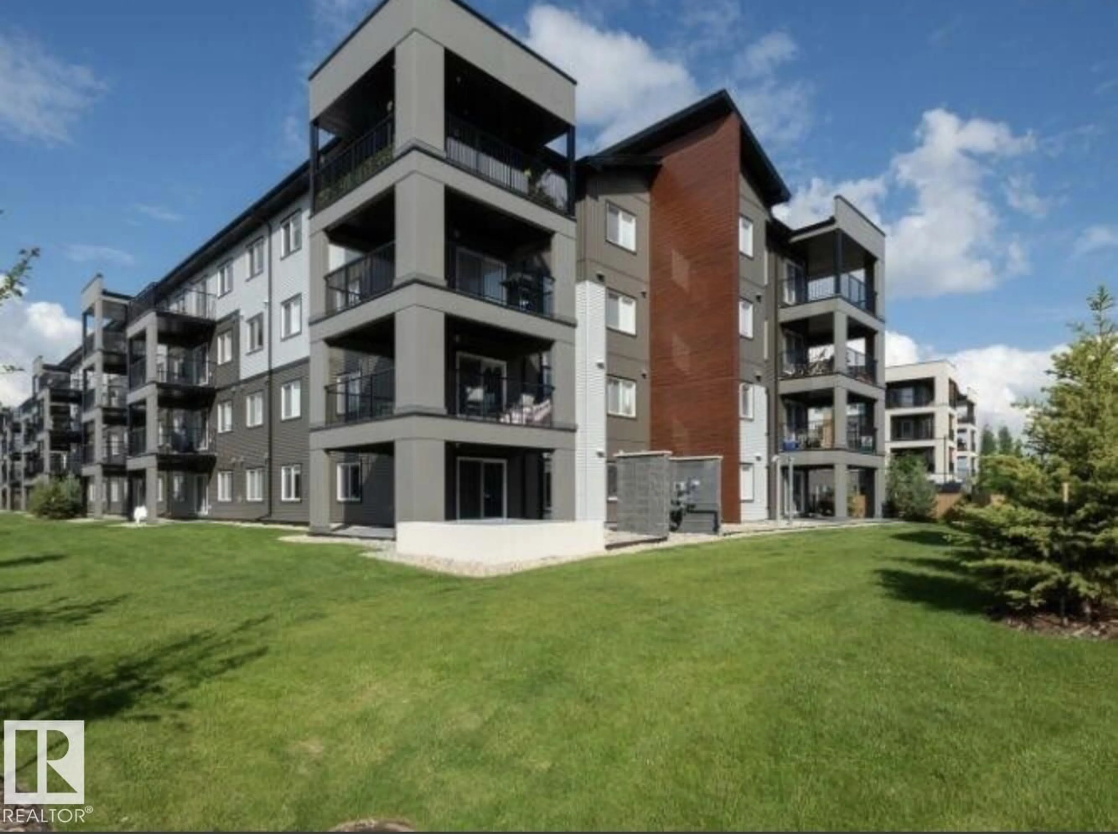 A pic from outside/outdoor area/front of a property/back of a property/a pic from drone, building for 210 394 WINDERMERE BV, Edmonton Alberta T6W0R1